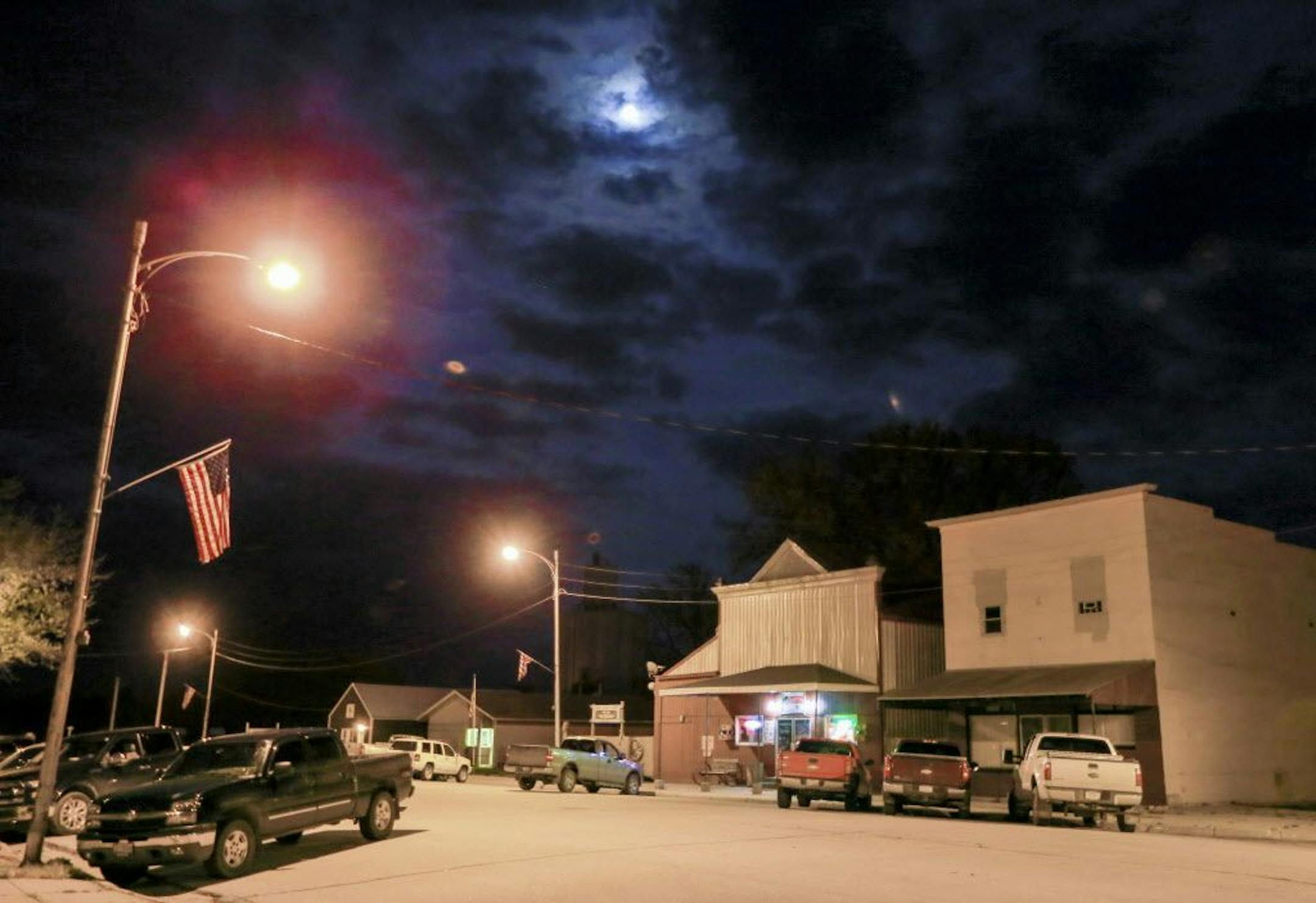 Cedar Street in the center of the village of Nickerson, Neb., is seen at night, Tuesday, April 19, 2016. When regional officials announced plans to open a $300 million chicken processing plant employing 1,100 workers, residents packed the firehall and the village board unanimously voted against the plant, and a week later the company gave up, saying they�d take their plant and jobs elsewhere.