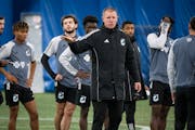 Minnesota United’s interim head coach Cameron Knowles instructed players during practice Tuesday at the National Sports Center in Blaine.