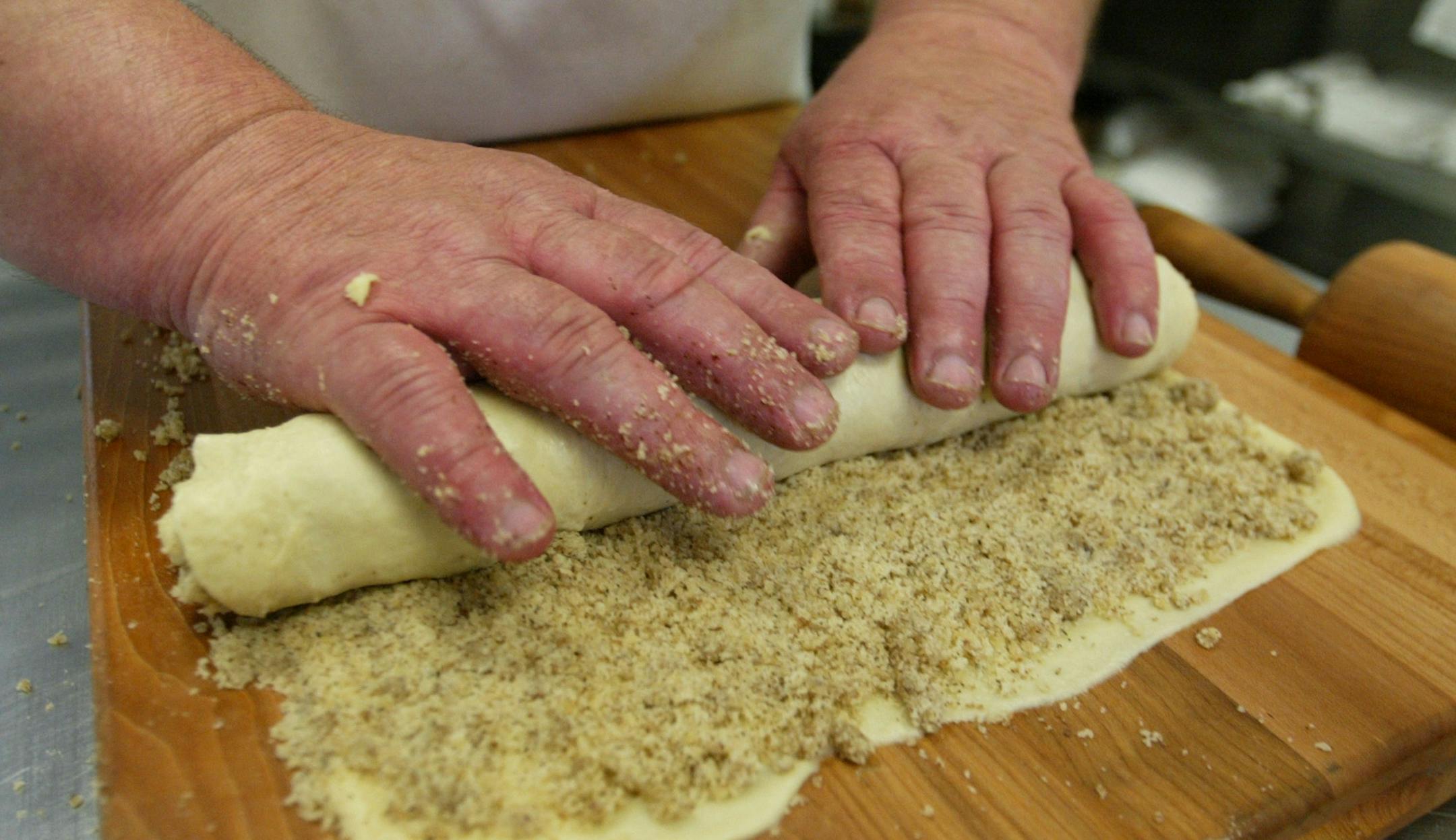 Ja'n Gadzo prepares Walnut Potica Rolls with his son Andrej at the Andrej's European Pastry shop he owns in Chisholm, MN. The two produce a standard run of about 100 rolls by hand in an afternoon.