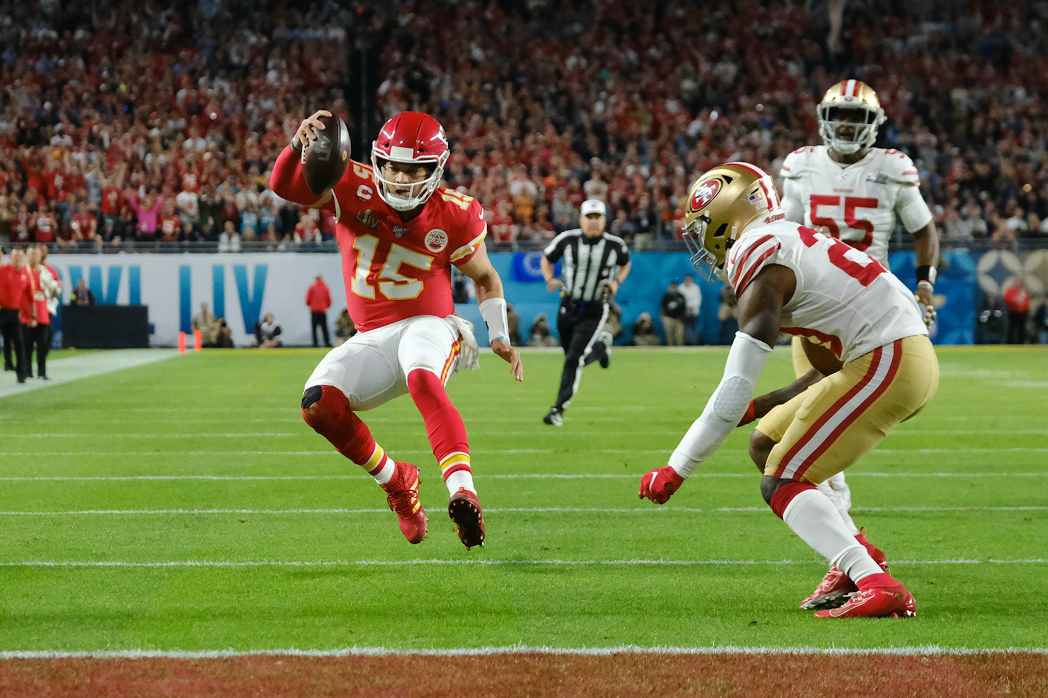 Kansas City Chiefs quarterback Patrick Mahomes (15) runs toward the endzone in the first quarter of Super Bowl LIV at Hard Rock Stadium in Miami Gardens, Fla., Feb. 2, 2020.