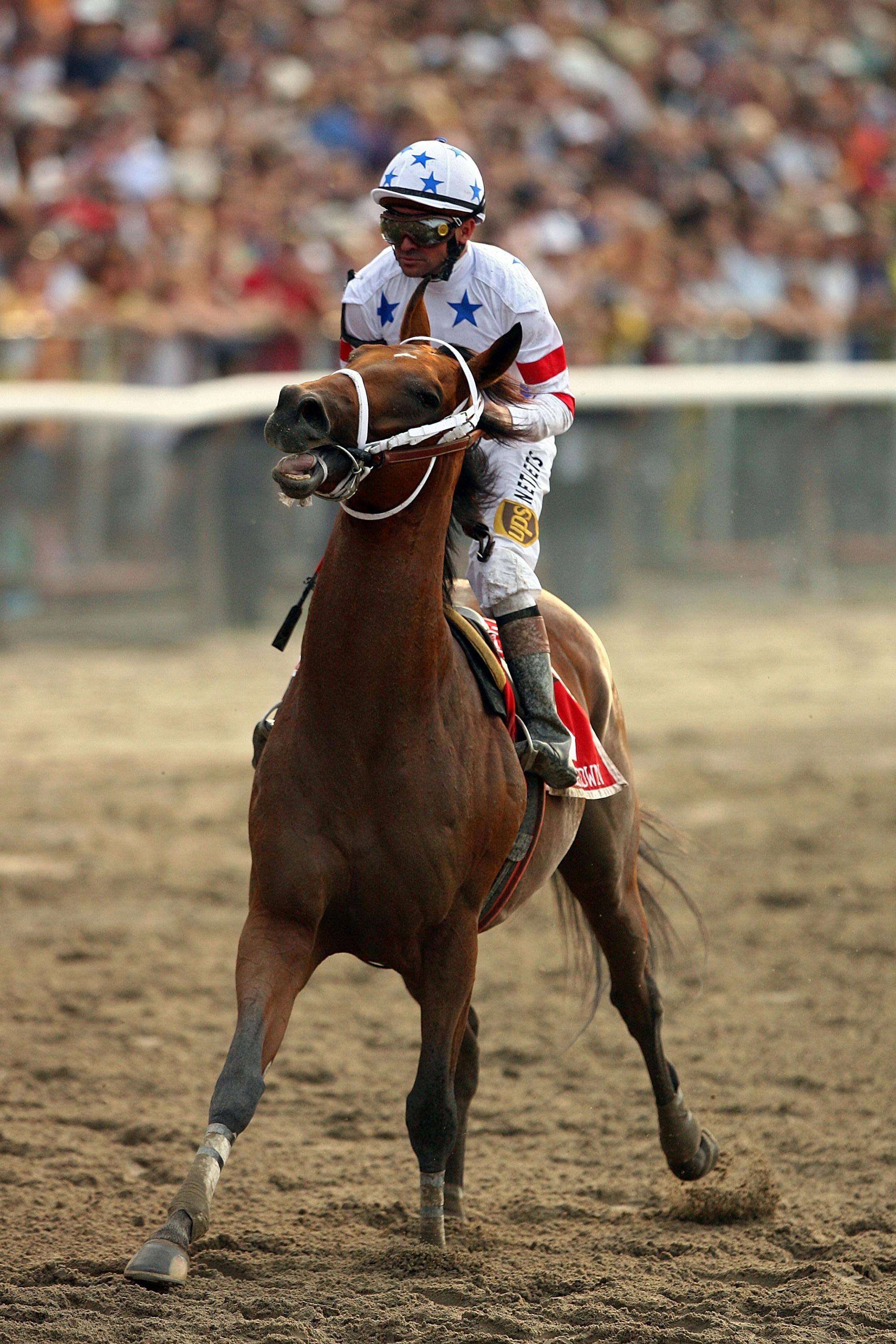 ELMONT, NY - JUNE 07: Big Brown ridden by jockey Kent Desormeaux, limps down the final stretch of the 140th running of the Belmont Stakes at Belmont Park on June 7, 2008 in Elmont, New York.