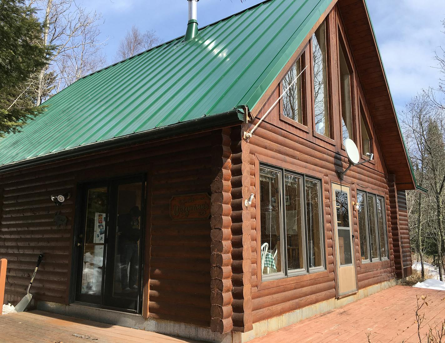 A company built the log shell, before the family finished the interior.