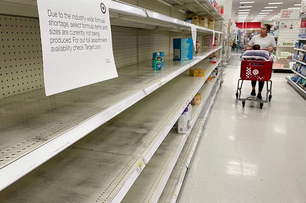 A woman shops for baby formula at Target in Annapolis, Md., on May 16, 2022, as a nationwide shortage of baby formula continues due to supply-chain cr