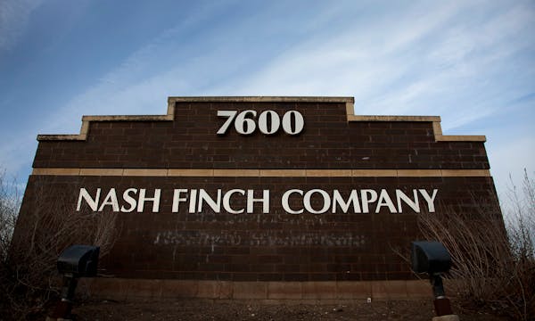 Nash Finch Co. signage is displayed outside of the company's headquarters in Edina, Minnesota, U.S., on Wednesday, Dec. 28, 2011. The economy in the M