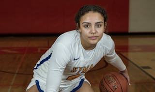 Tessa Johnson of St. Michael-Albertville is Player of the Year on the All-Metro girls basketball team in St. Louis Park, Minn., on {wdat). This is for