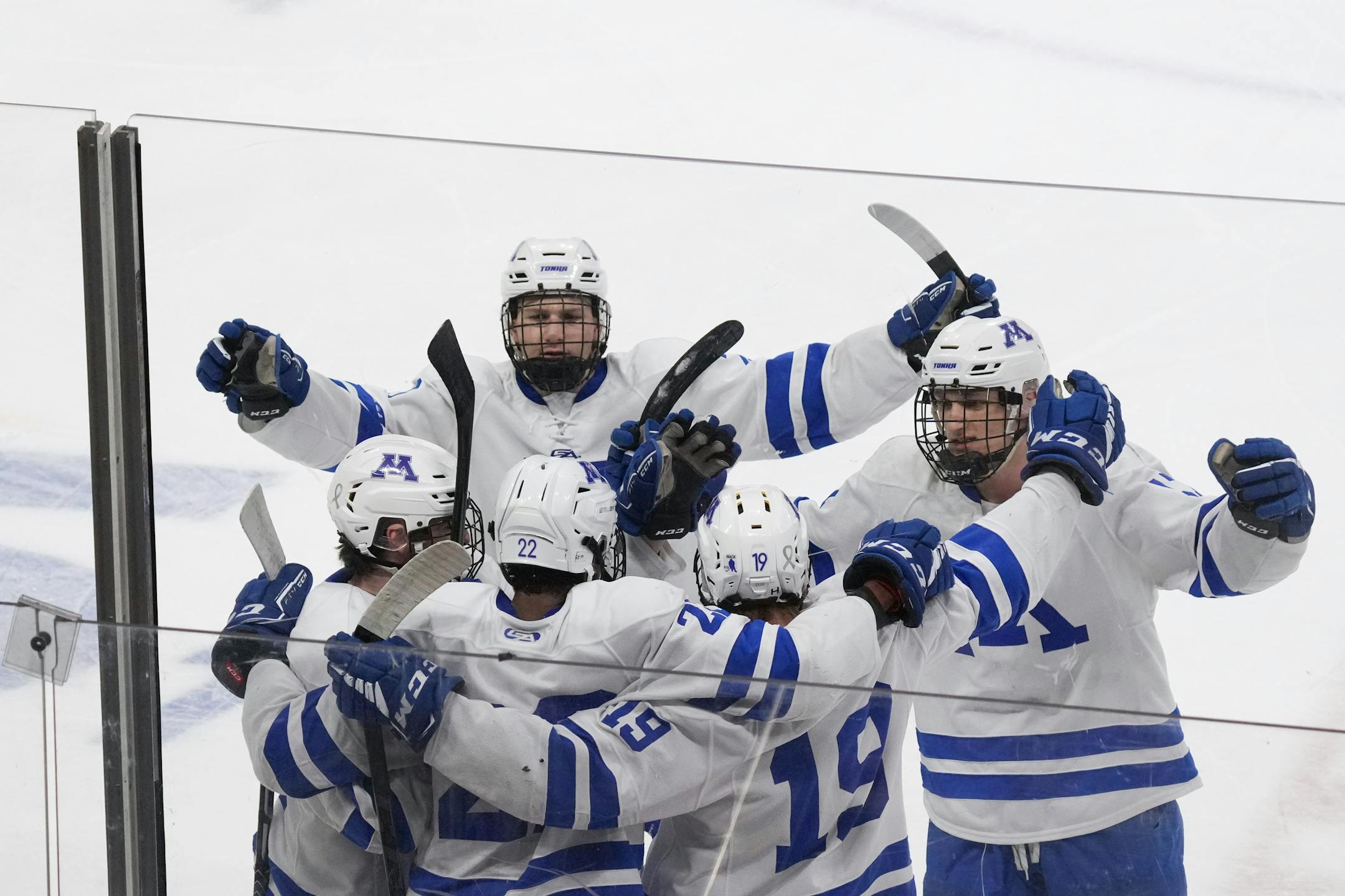 Minnetonka forward Hagen Burrows (19) scores the first goal of the game against Edina in the first period.