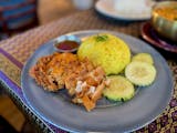 Basil Cafe Khao Mun Gai Taut - fried chicken with rice, cucumbers and house made sauce.