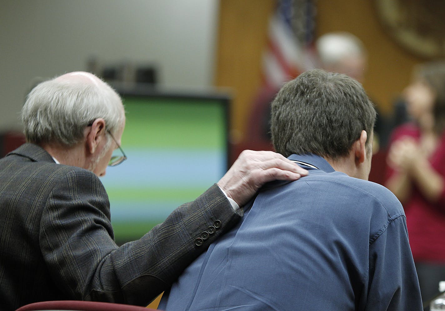 Aaron Schaffhausen's Defense Attorney John Kucinski gave Shaffhausen a hug after looking at photos of the crime scene during testimony on the 9th day of trial at a St. Croix County Courtroom in Hudson, Wis., Friday, April 12, 2013. (ELIZABETH FLORES/STAR TRIBUNE) ELIZABETH FLORES &#x2022; eflores@startribune.com