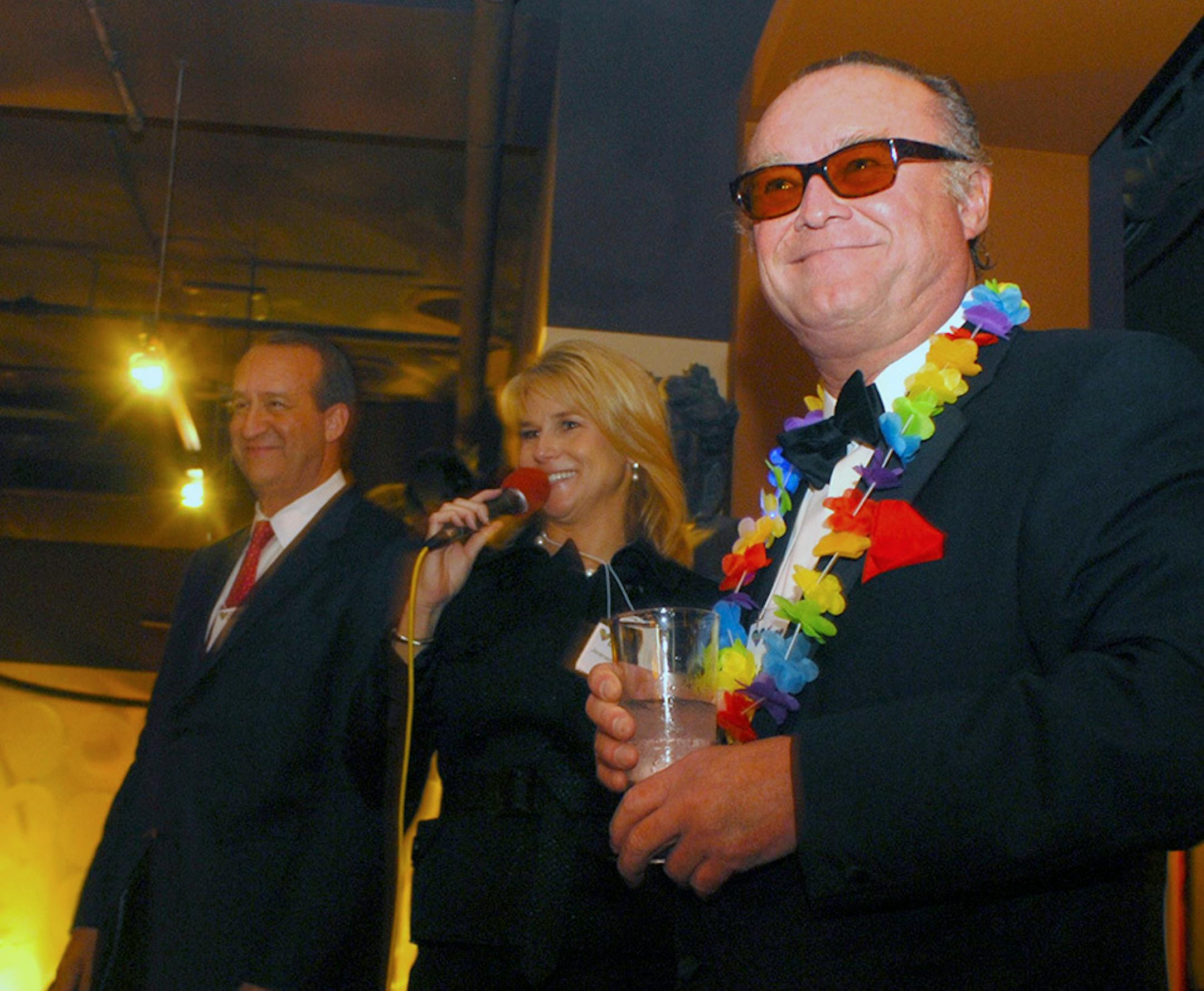 Hosts Mark Rosen and Jeanette Trompeter with Jack Nicholson look alike John Greenen at the "Date for Life" charity date auction at The View Restaurant in Minneapolis on Wednesday, October 22, 2008.