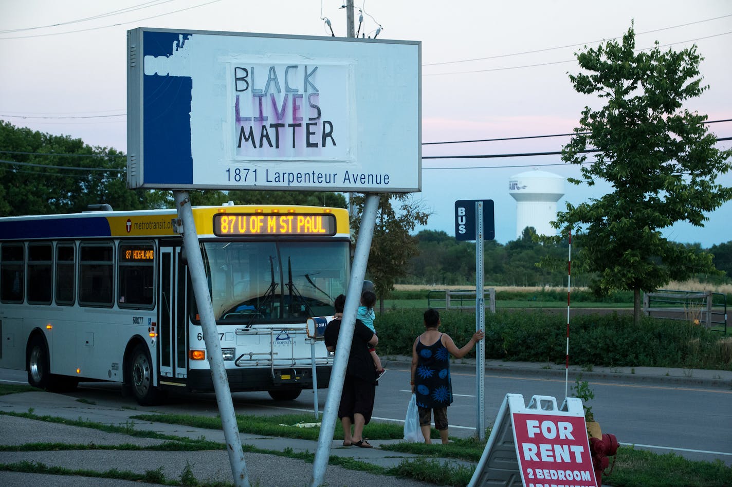 A Black Lives Matter poster is seen hung up on a business sign at Larpenteur Avenue at Lindig Street Thursday night in Falcon Heights. In the background, the Minnesota State Fair water tower is visible. ] (AARON LAVINSKY/STAR TRIBUNE) aaron.lavinsky@startribune.com Since last Weds, Falcon Heights -- a 2-square-mile town not even big enough to have its own police force -- has been violently thrust onto the wrong side of a heated national topic. As the mayor just said the day after: &#x201c;This i