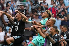 Minnesota United players celebrate the win with their fans following an MLS game between Minnesota United and the Houston Dynamo.
