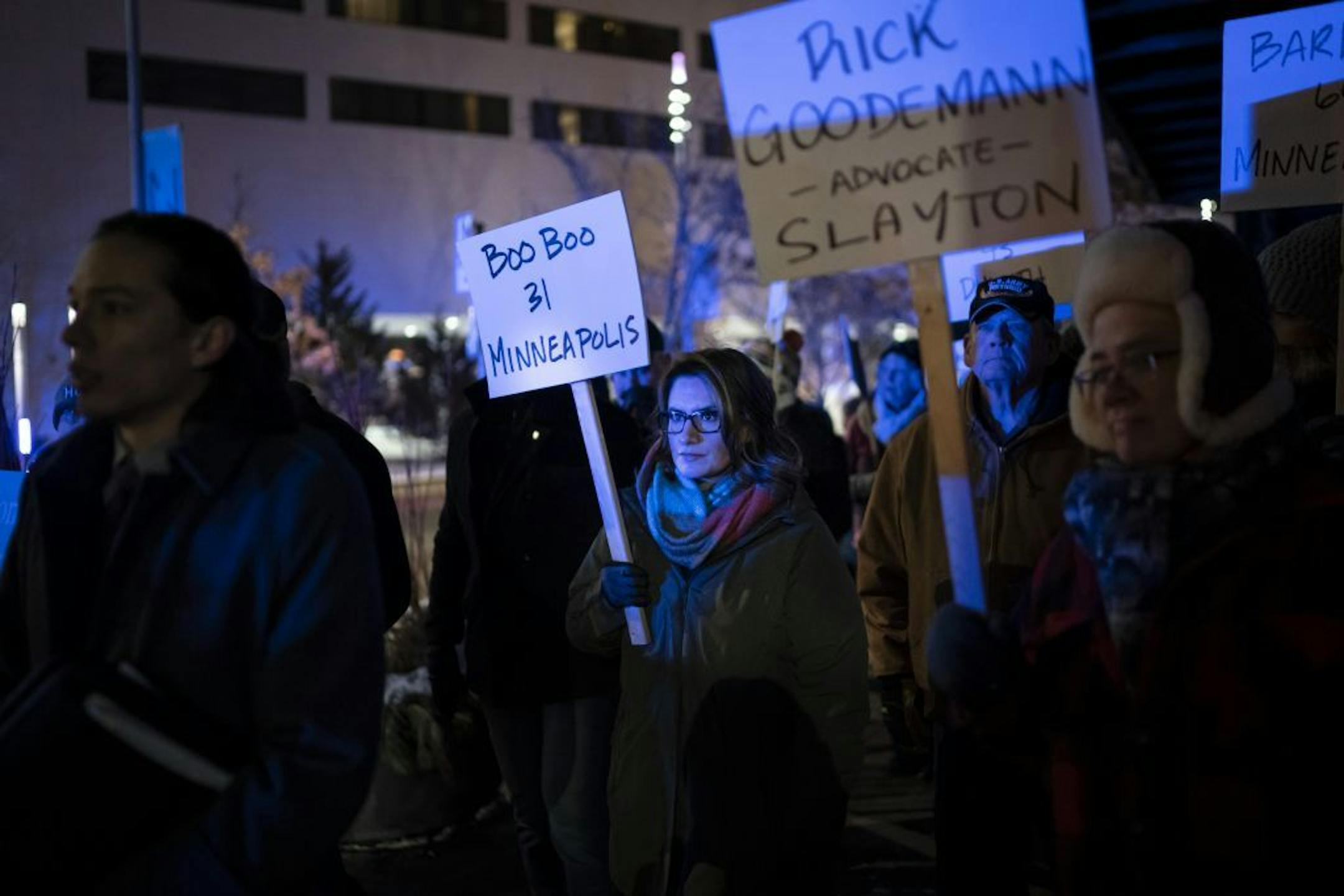Lieutenant Governor Peggy Flanagan marched in the silent Homeless Memorial March carrying one of many signs that recognized the 190 homeless, previously homeless and advocates for the homeless that died in 2019 on Thursday, December 19, 2019 through downtown Minneapolis, Minn.