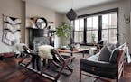 The pairing of walnut and black creates an instant mid-century vibe in this living room. (Scott Gabriel Morris/Handout/TNS)