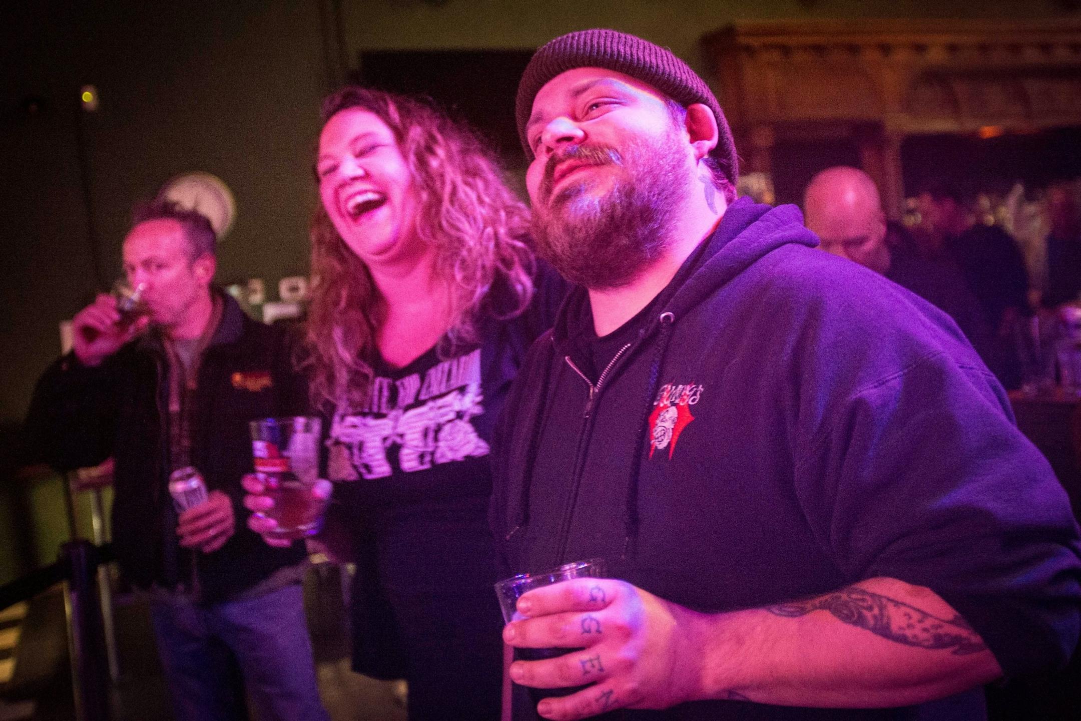Ryan Hapsch, right and Laura Preston enjoy there performance of Appetite for Zaccardi at Turf Club early Saturday morning.