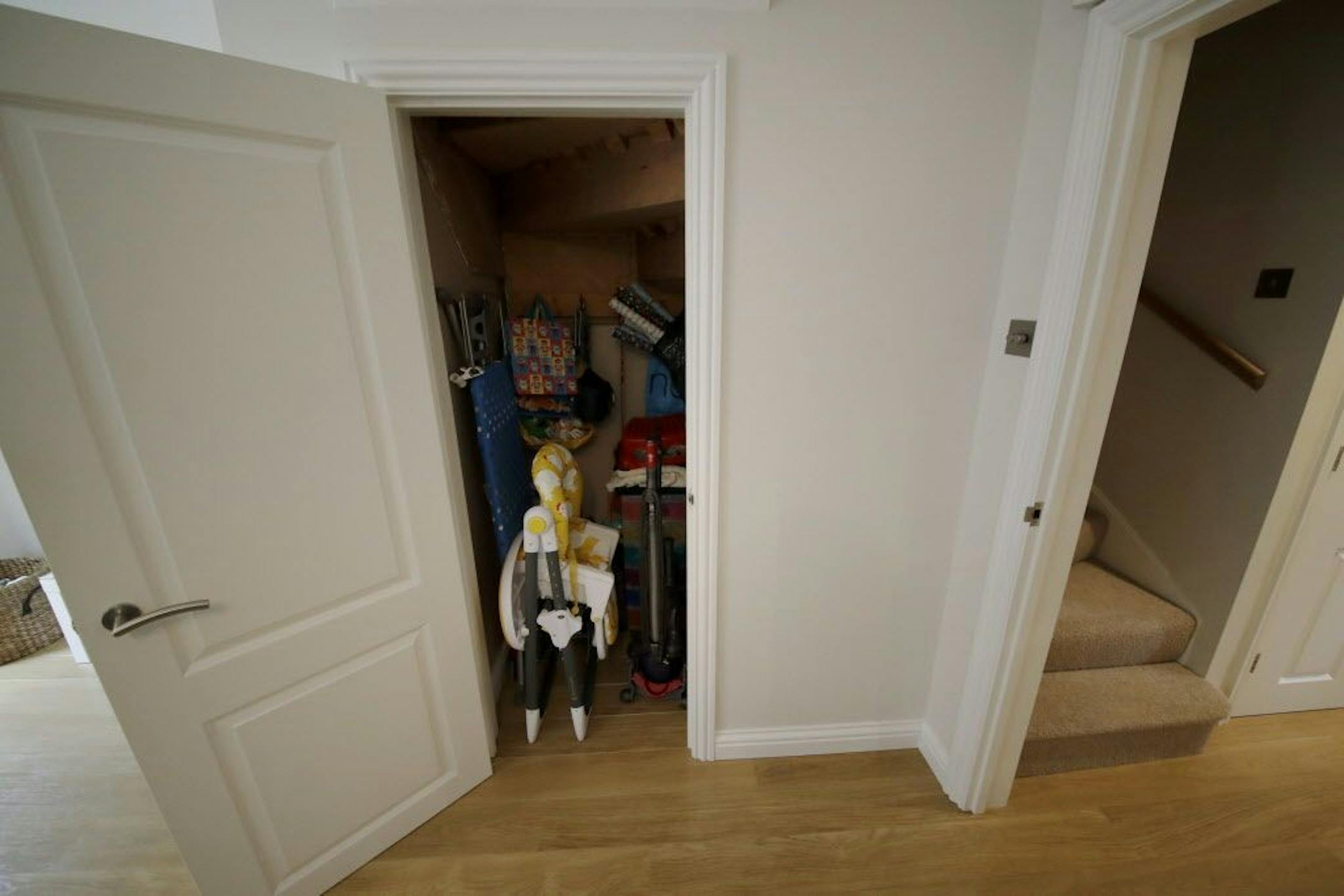 A cupboard under the stairs, which was replaced by one filmed in a studio, is shown in the house for sale that starred onscreen as Harry Potter's childhood home in the town of Bracknell, England, just over 30 miles (50 kms) west of central London, Tuesday, Sept. 20, 2016. Fans of the boy wizard will recognize it as the fictional address of 4 Privet Drive, home of Harry's dastardly aunt and uncle, the Dursleys, who made him sleep in a cupboard under the stairs. The 3-bedroom house is being sold b