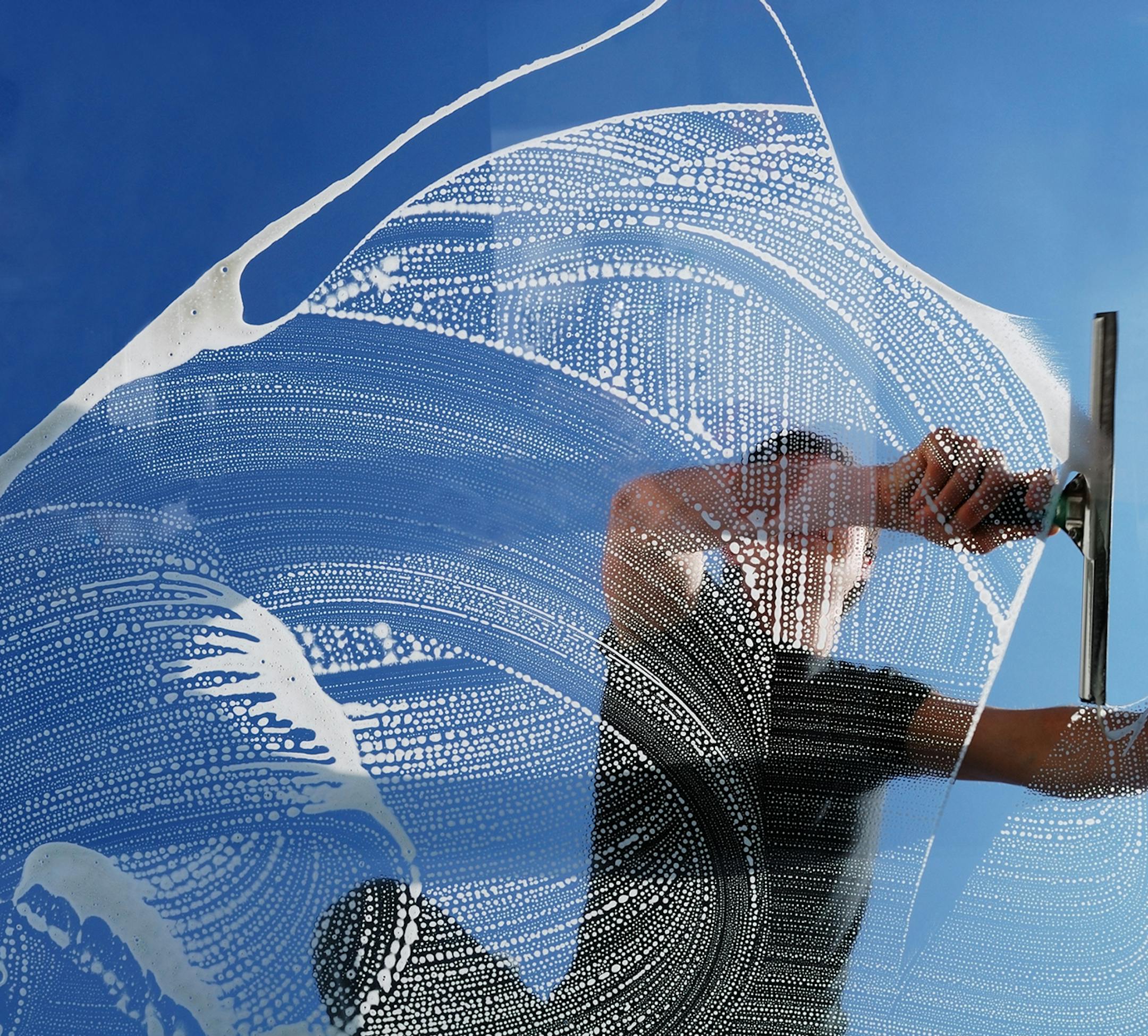 Want clean windows? Do what the pros do and use a squeegee.