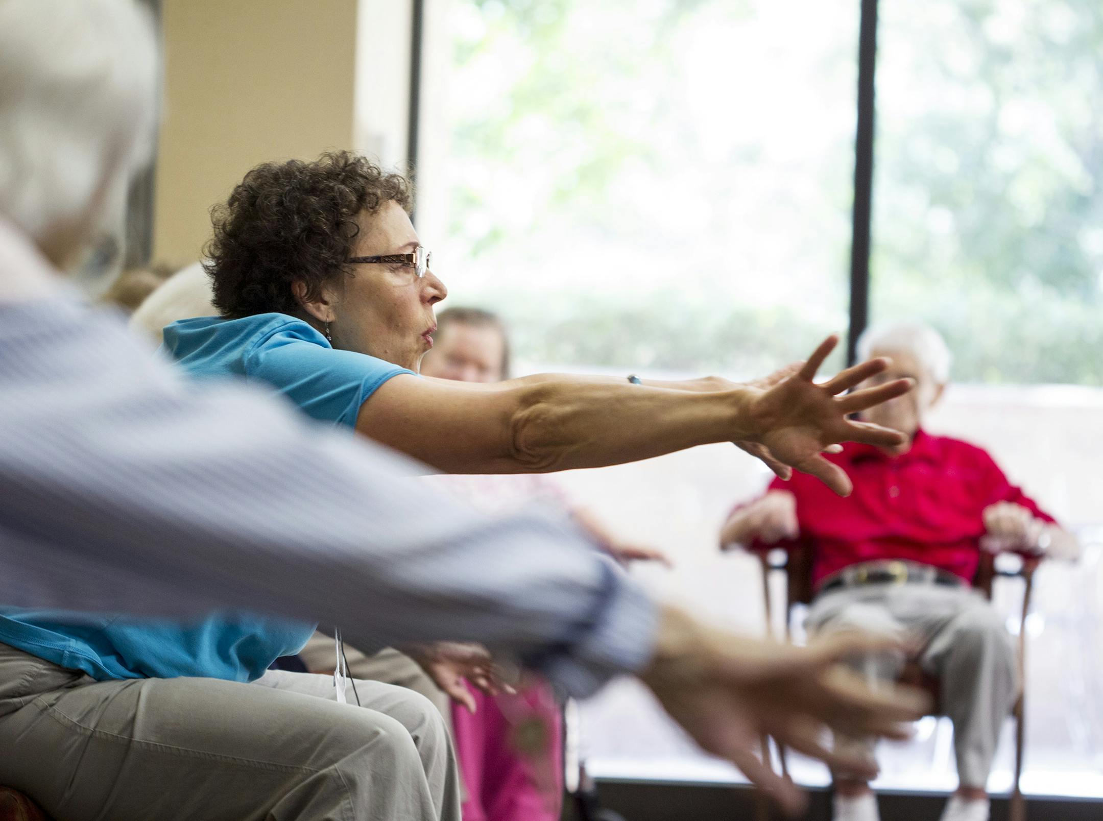 Instructor Pola Rest leads Ageless Grace, a Senior Sneakers Flex class, at The Wellington in St. Paul July 16, 2014. (Courtney Perry/Special to the Star Tribune)