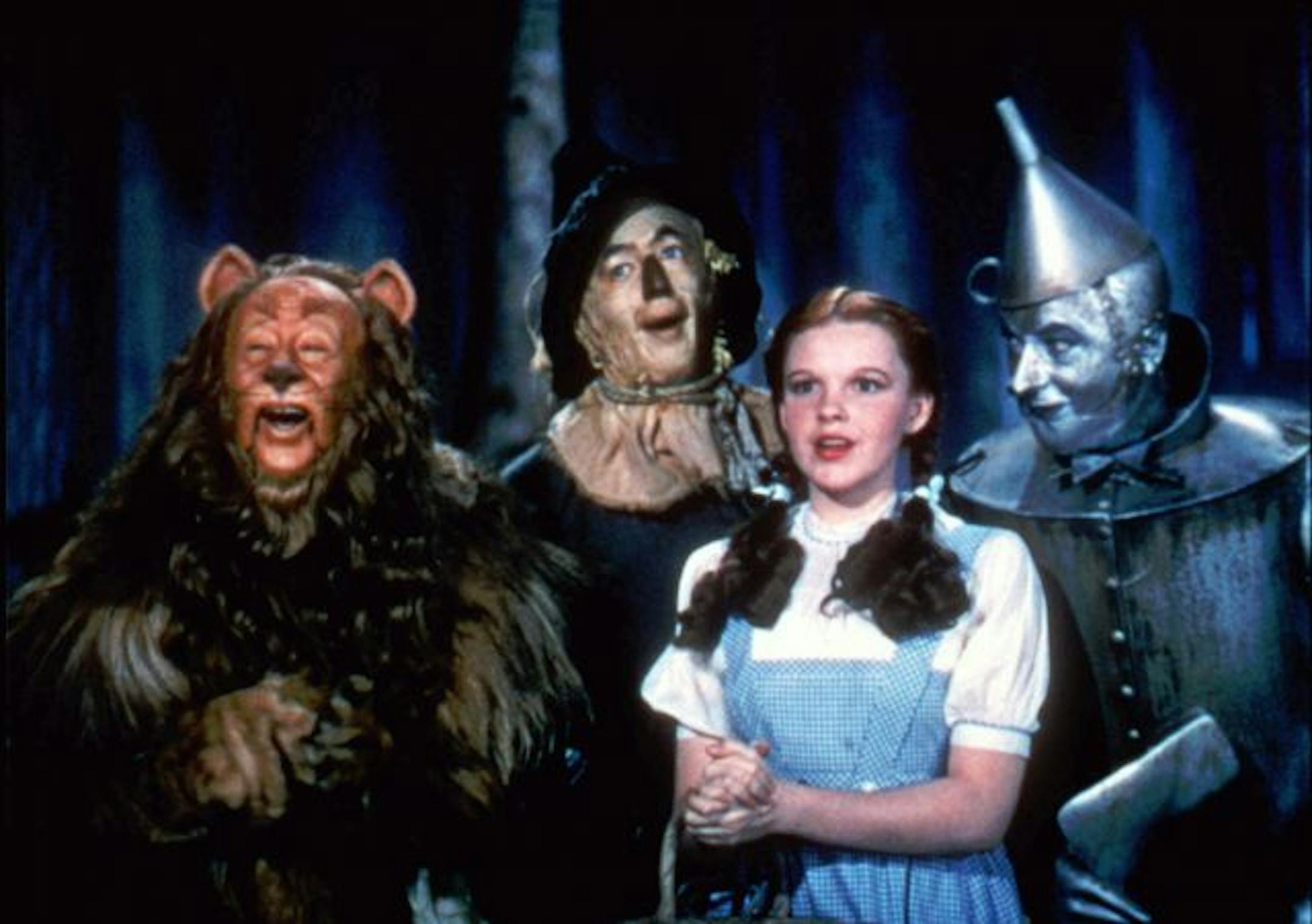FILE - In this 1939 file photo originally released by Warner Bros., from left, Bert Lahr as the Cowardly Lion, Ray Bolger as the Scarecrow, Judy Garland as Dorothy, and Jack Haley as the Tin Woodman, are shown in a scene from "The Wizard of Oz."