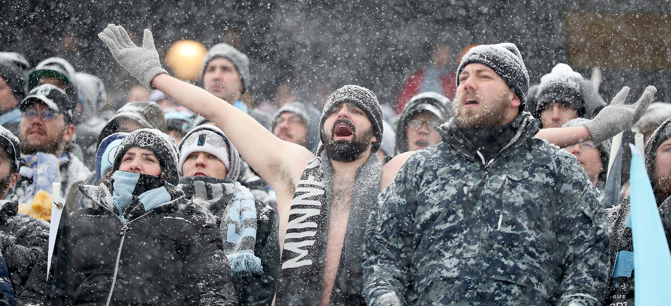 Minnesota United FC fans braved the cold and snow to cheer for the team during the first half as the Minnesota United FC took on Atlanta United at TCF Bank Stadium, Sunday, March 12, 2017 in Minneapolis, MN. ] ELIZABETH FLORES • liz.flores@startribune.com