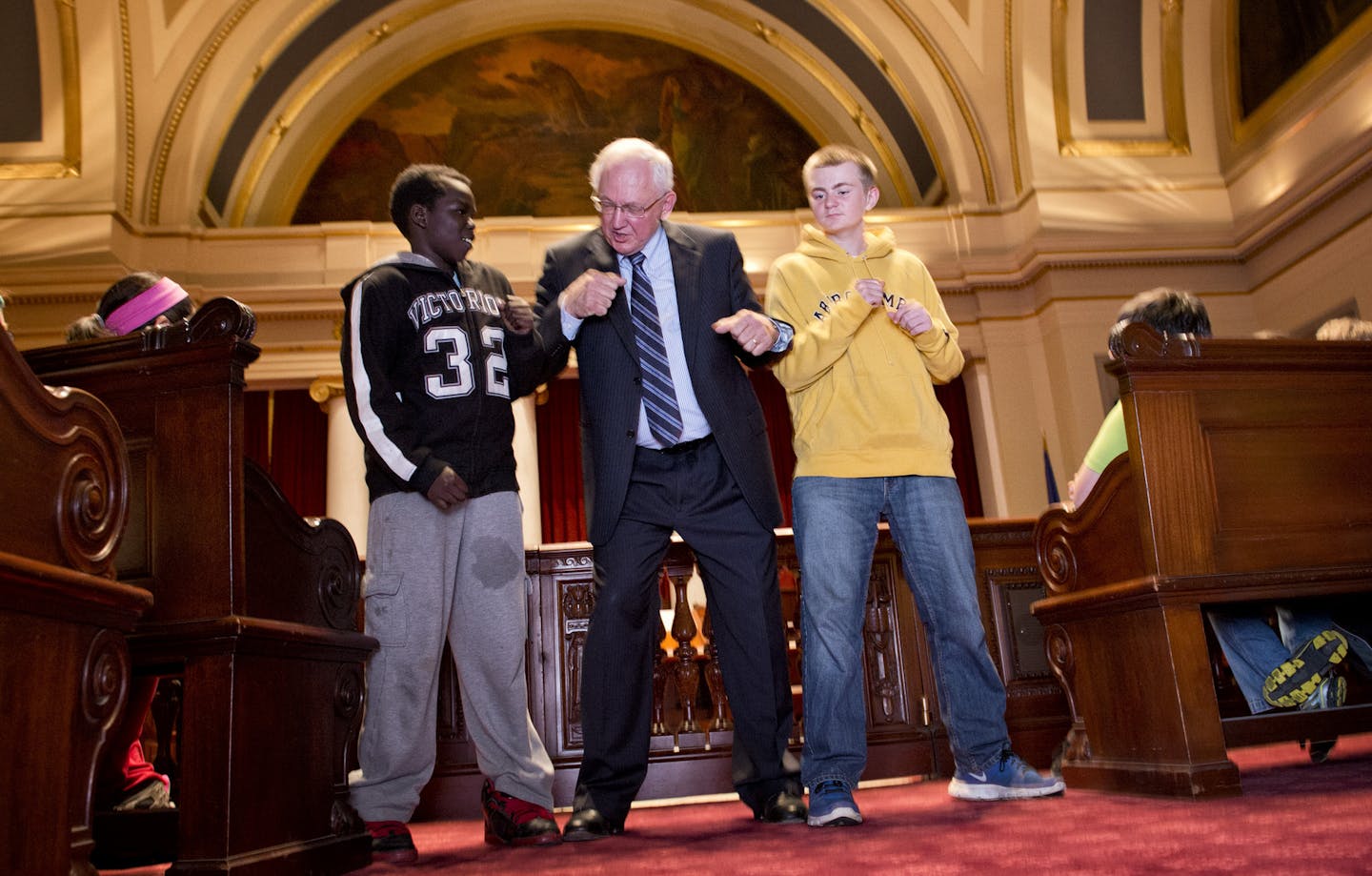 Retiring Supreme Court Justice Paul Anderson came to the Supreme Court chambers in the Capitol to have his portrait taken but couldn't resist talking to this group of school kids from Albert Lee on the importance of the legislative branch of government. These boys happily volunteered when he asked them to try to box him like they were playing basketball to show how the other two branches of government try to push their agendas in the courts. Thursday, May 30, 2013 ] GLEN STUBBE * gstubbe@startri