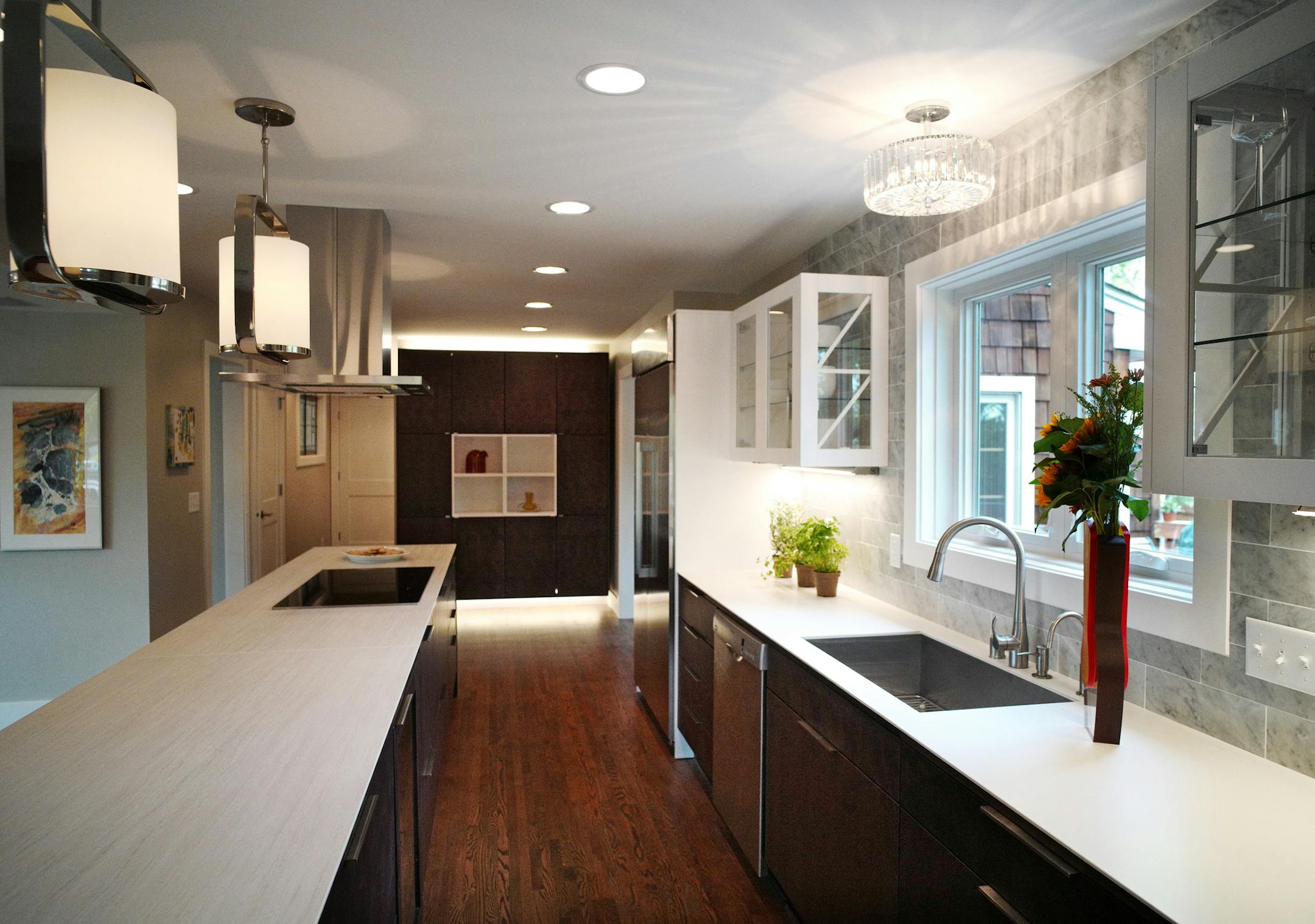 The Oszustowicz family's new kitchen by Puustelli is bright and open, with clean-lined, Scandinavian-style features and a large center island.