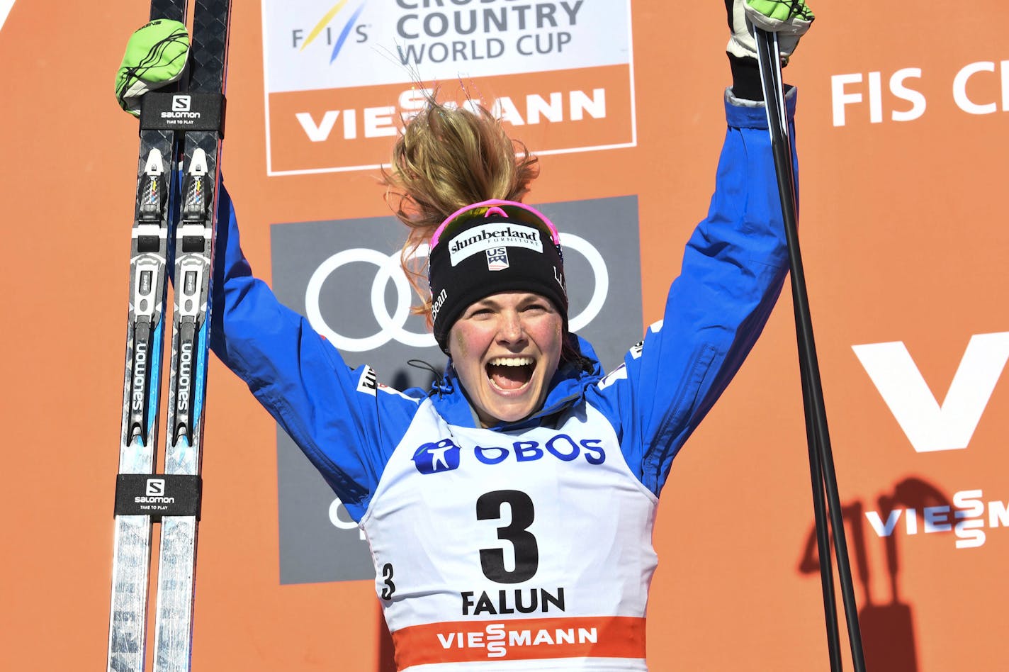 Jessica Diggins of the United States, celebrates on the podium after finishing in second place in the 10km cross country free style event of the Cross Country World Cup, in Falun, Sweden, Sunday March 18, 2018. (Ulf Palm /TT News Agency via AP)