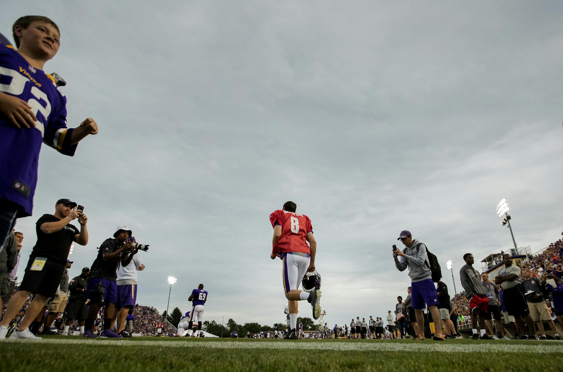 Minnesota Vikings Sam Bradford ran onto the field before the scrimmage at Blakeslee Stadium in Mankato.