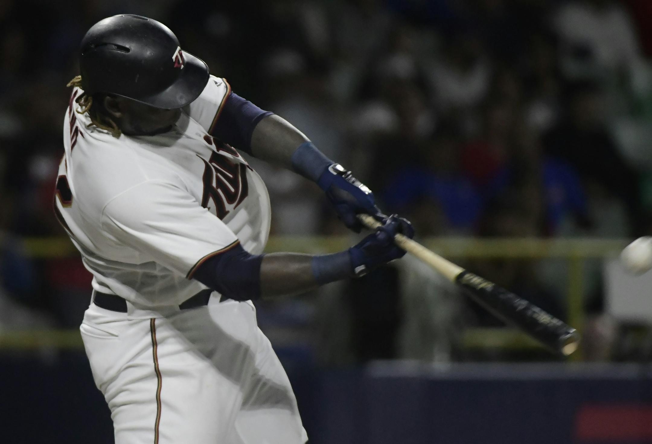 Minnesota Twins' Miguel Sano hits a home run, to tie the game in the fourteenth inning of the final game of a two-game Mayor League Series against the Cleveland Indians at Hiram Bithorn Stadium in San Juan, Puerto Rico, Wednesday, April 18, 2018.