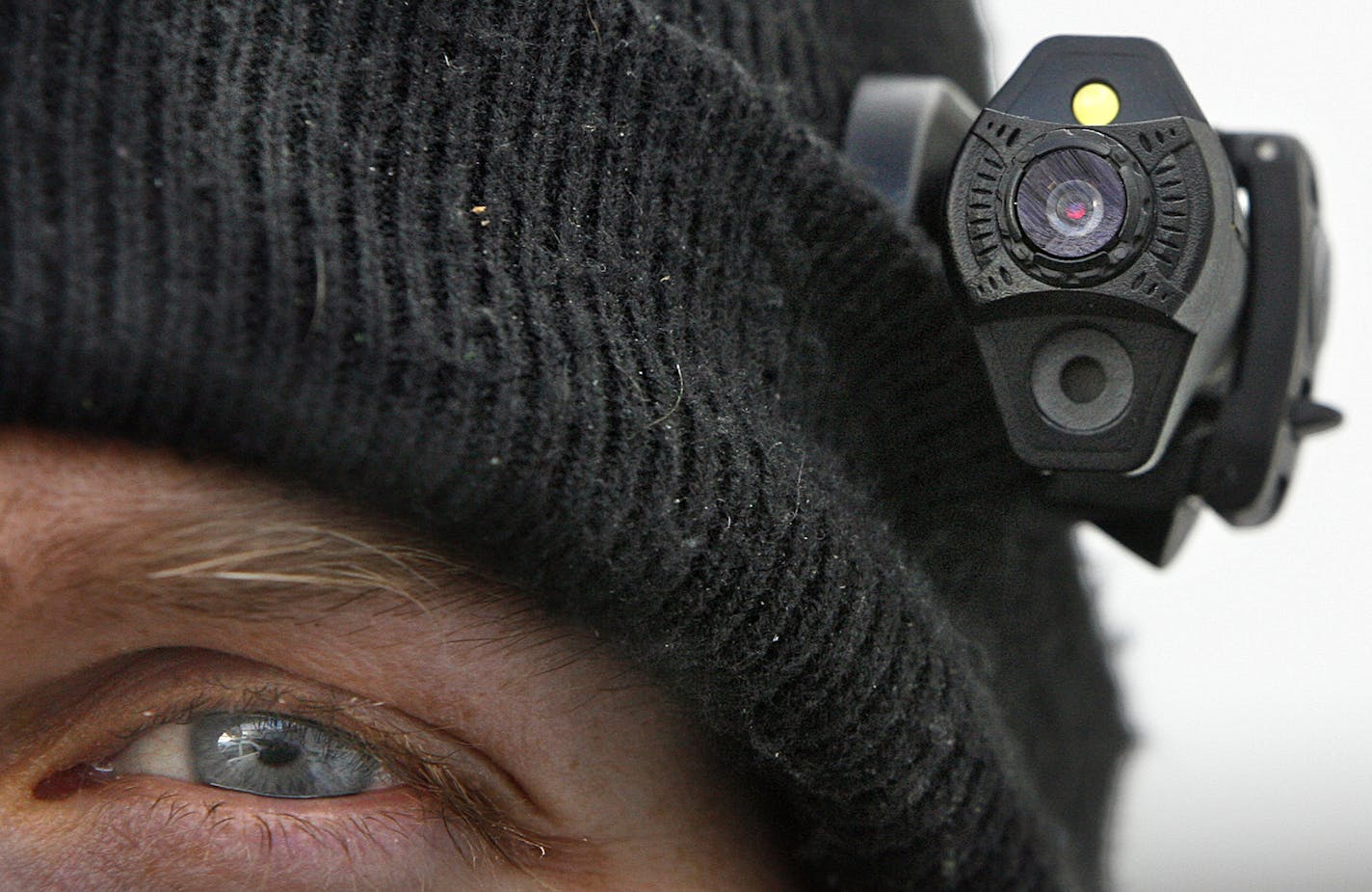 JIM GEHRZ &#x201a;&#xc4;&#xa2; jgehrz@startribune.comBurnsville/December 1, 2010/12:30 PMSome officers with the Burnsville Police Department are wearing tiny cameras which allow them to record traffic stops and calls while on patrol. IN THIS PHOTO:]Officer Chris Biagini said the camera employs a 30-second buffer, which allows an officer to press a button and begin recording a scene, with the start of the recording starting 30 seconds previous. The data is stored on a digital recorder and later s