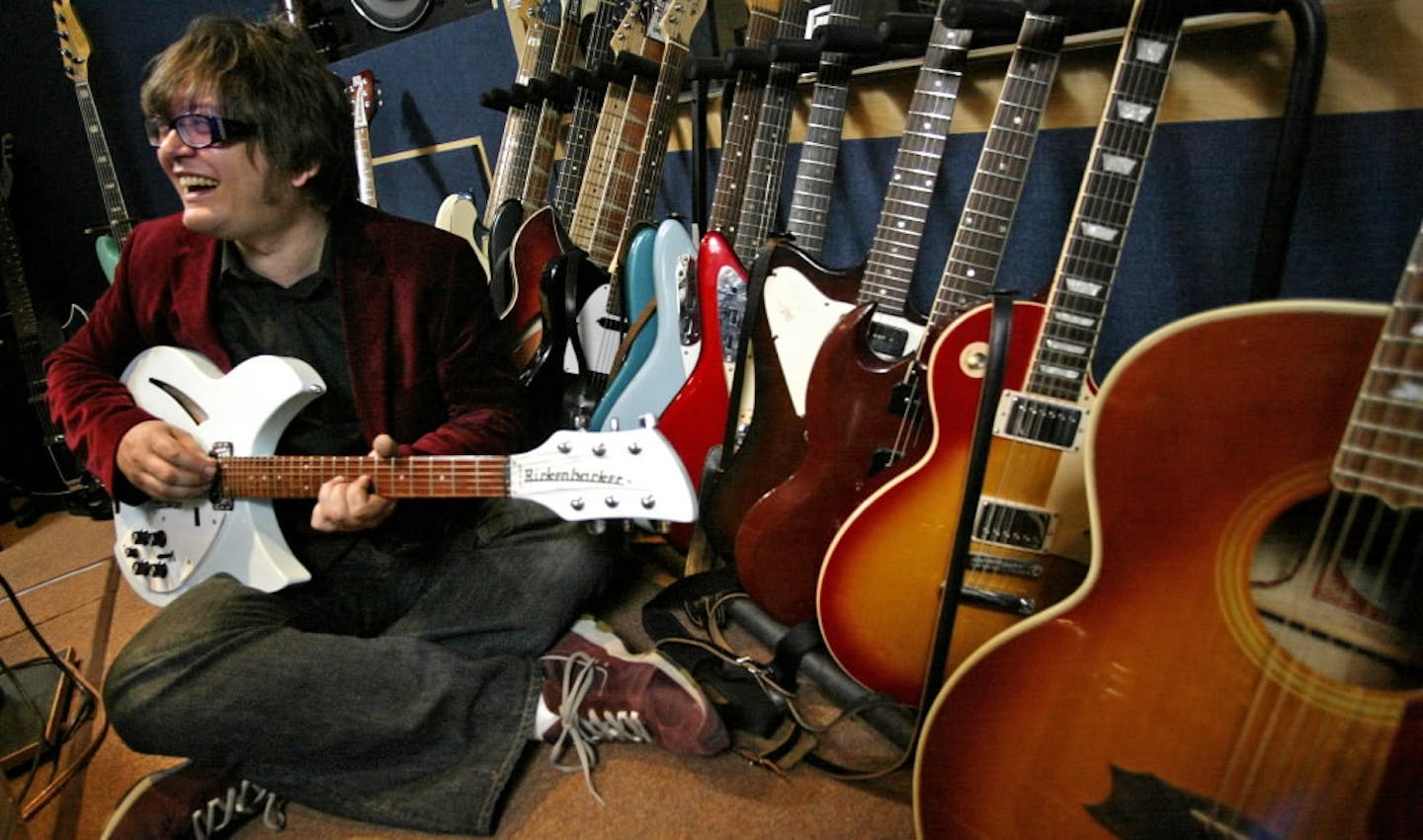 Ed Ackerson relaxing with some of his closest friends at his Flowers Studio in 2005.