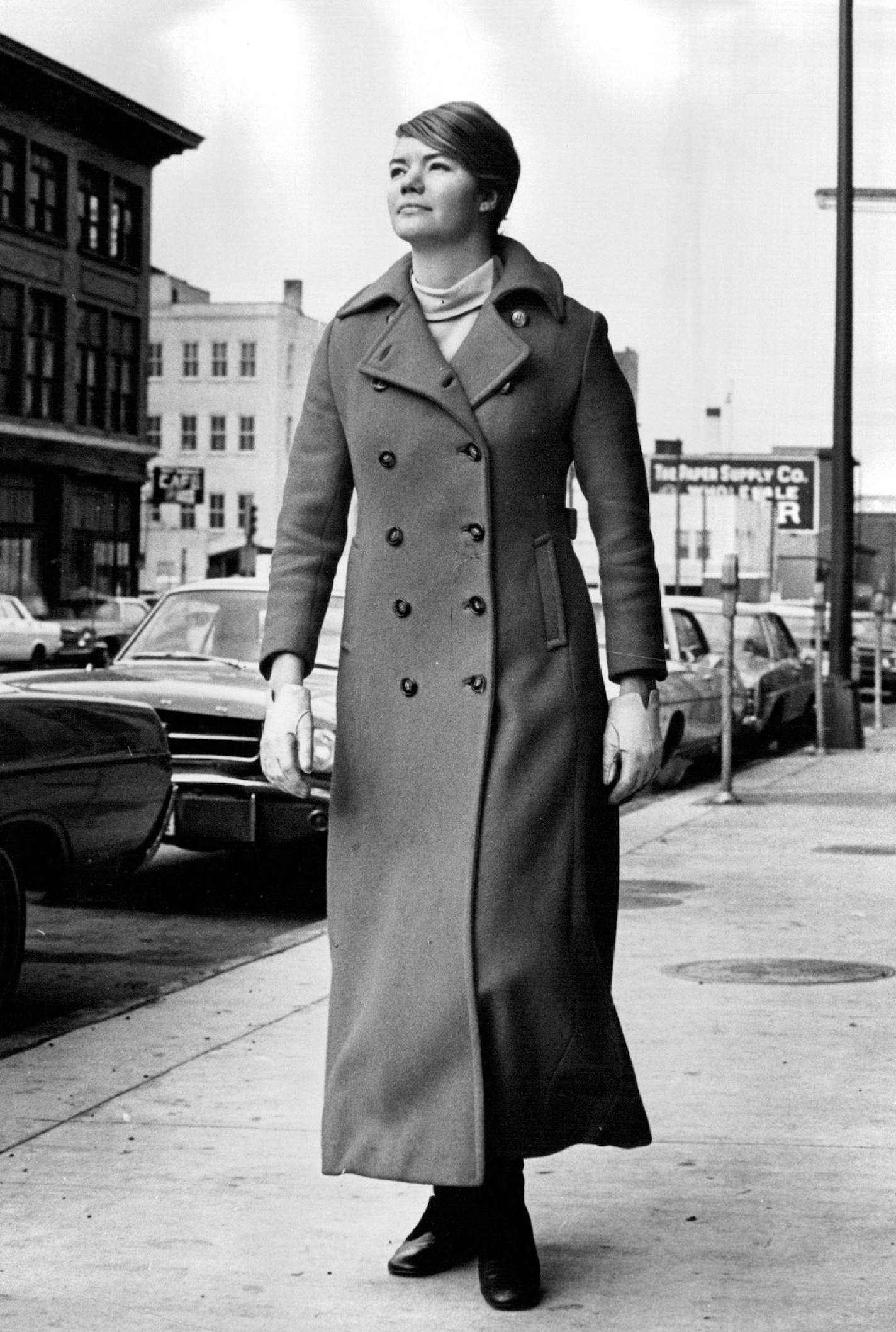 November 10, 1991 Molly Ivins, then a reporter for the Minneapolis Tribune, modeled her new red maxicoat on a downtown street in 1969. Even my worst enemies have never accused me of being style-conscious: I honest to God bought the thing because I wanted a warm coat. I'd suffered through two Minneapolis winters in my sister's friend's high school car coat before I saved enough money out of my munificent reporter's salary to be able to buy a real Yankee coat. October 24, 1969 November 16, 1969 Po