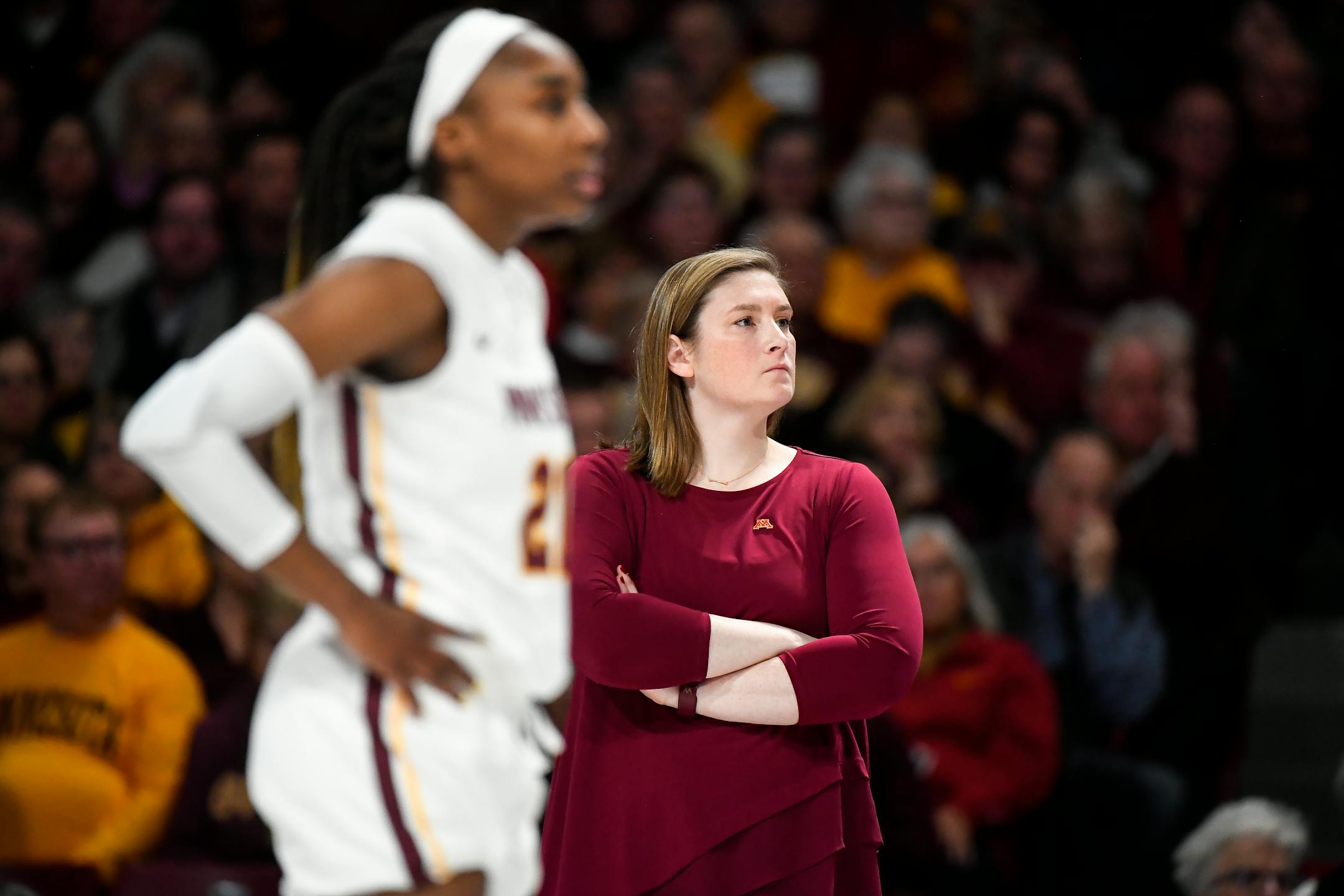 Guard Kenisha Bell (shown with coach Lindsay Whalen in a recent game against New Hampshire) scored a team-high 18 points as the No. 25 Gophers women's basketball team easily beat Xavier 73-53 on Wednesday night.