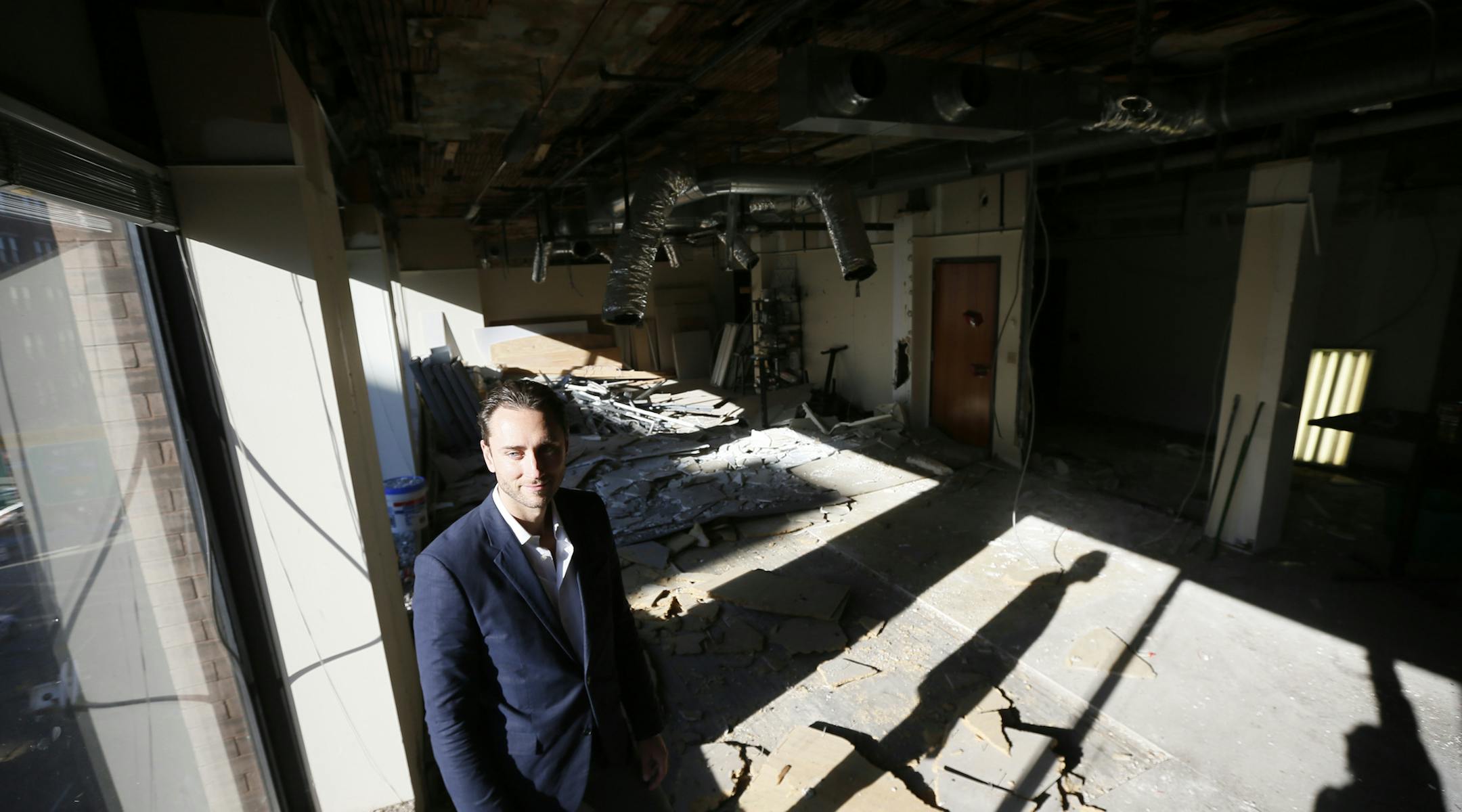 Nicolas Thomley President and CEO of Pinnacle Services . Last month he completed a $1.15 million the purchase of 106 Third Street North, a four-story, 1905-vintage building whose main tenant is the two-story bar Jackson's Hole.Wednesday November 13, 2013 in Minneapolis , MN. ] JERRY HOLT ‚Ä¢ jerry.holt@startribune.com