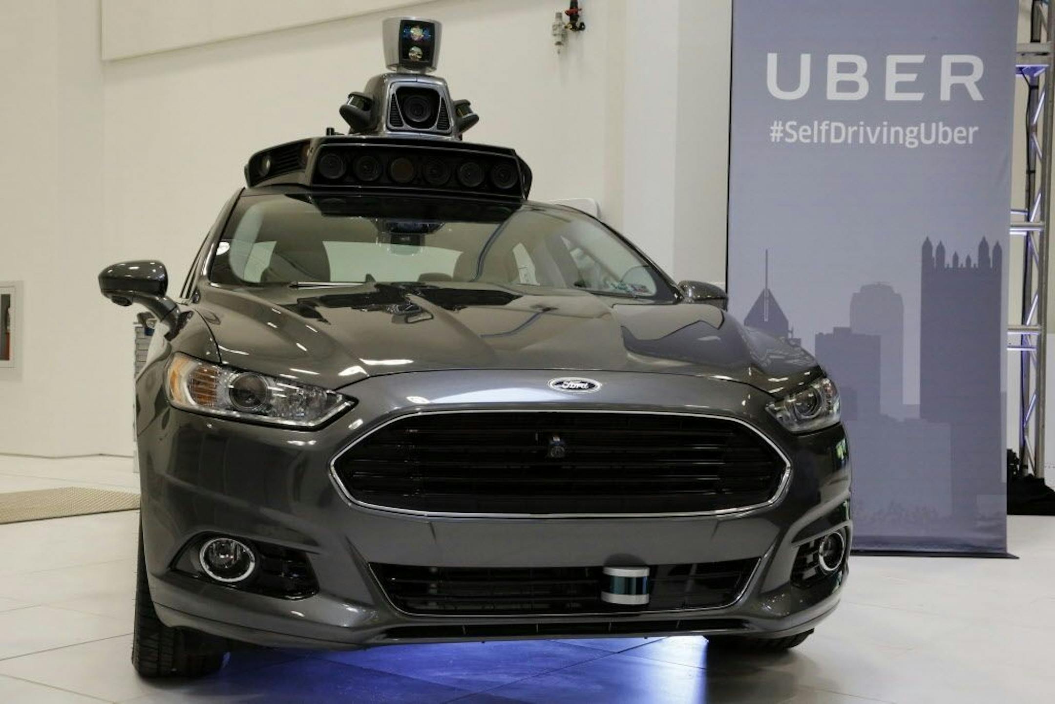 This is a self driving Ford Fusion Hybrid Uber on display at the companies' Advanced Technologies Center in Pittsburgh on display for journalists during a media preview Monday, Sept. 12, 2016.