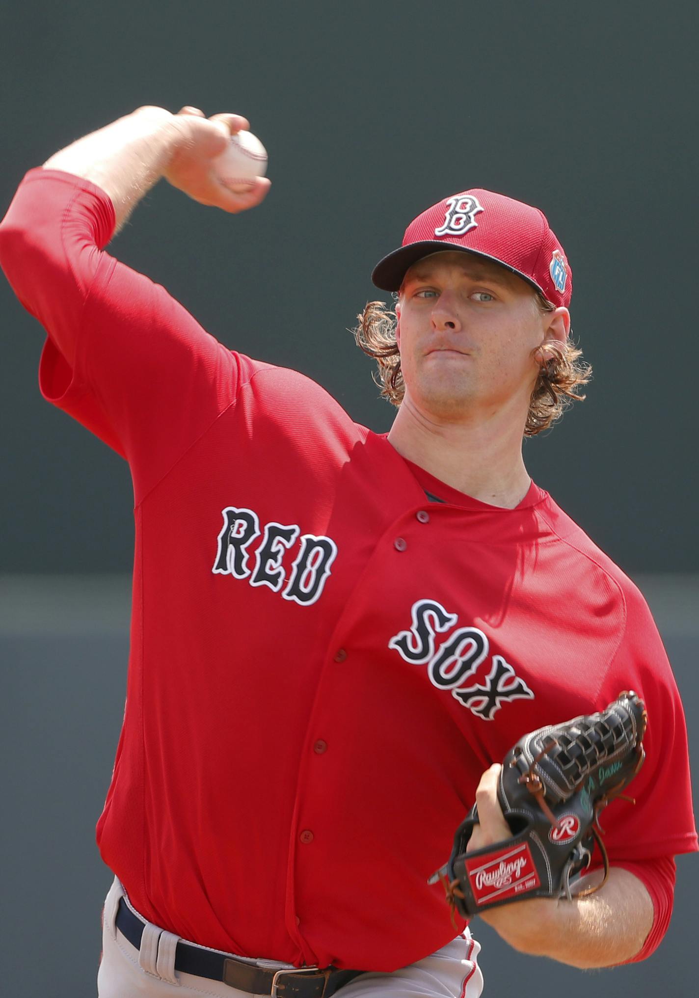 Boston Red Sox' Justin Haley throws a warm up pitch in the first inning of a spring training baseball game against the Baltimore Orioles on Saturday, March 26, 2016, in Sarasota, Fla. (AP Photo/Tony Gutierrez) ORG XMIT: OTKTG205