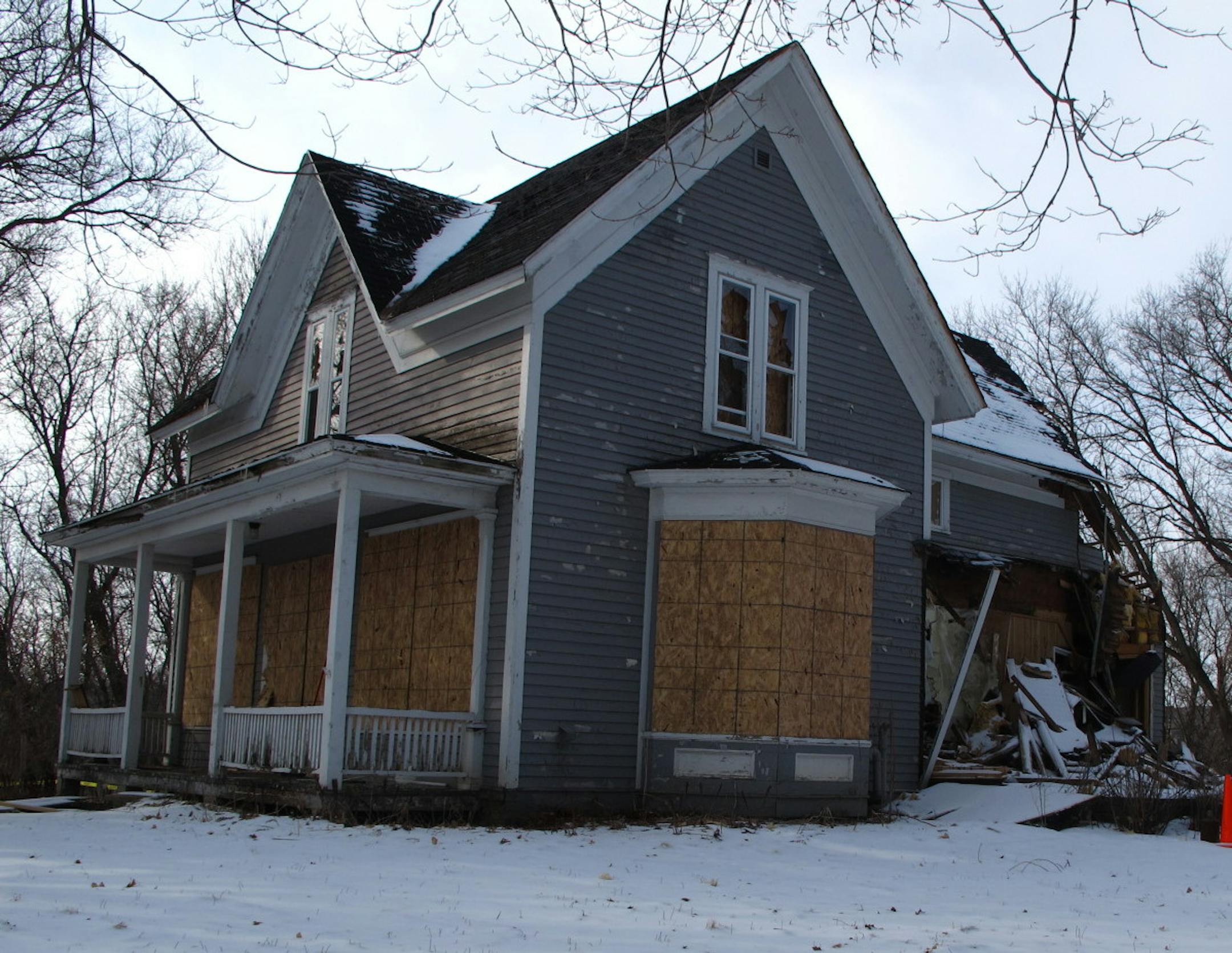 The Boutwell House, shown last week, was partially demolished from the back. Chimneys were removed years ago but the house otherwise closely resembles its early version.