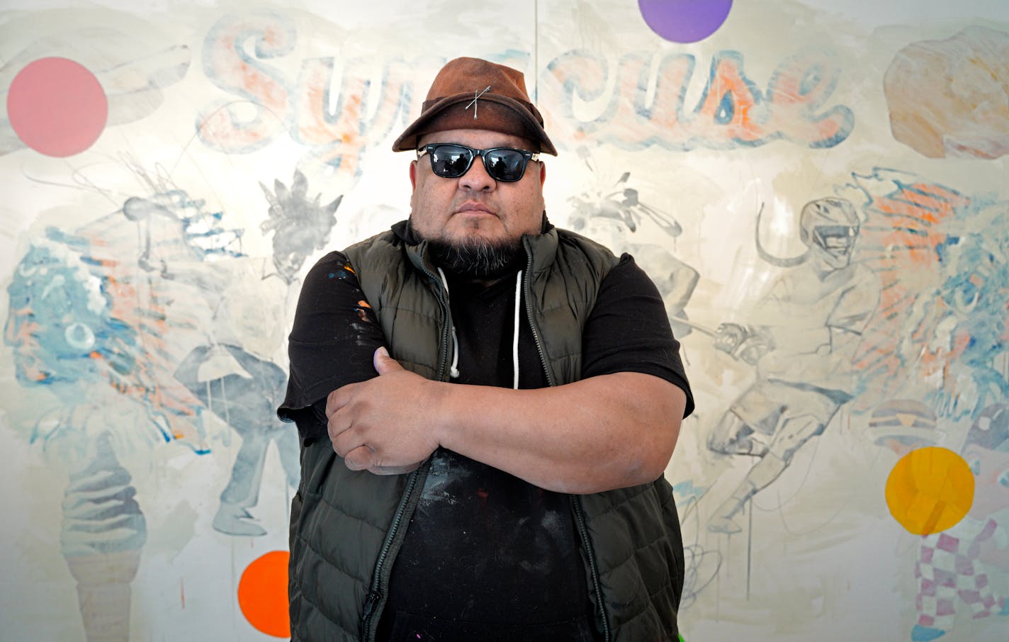 Artist Frank Buffalo Hyde in front of one of his recent paintings in his garage studio at his Northfield home. Tuesday, March 14, 2023 in Northfield, Minn. On the new reality series "The Exhibit," Frank Buffalo Hyde knew he'd be representing, for better or worse, Indigenous artists. Turns out he's repping Minnesota, as well. The painter and sculptor is from Santa Fe. But during the pandemic, his ceramicist wife got a job at St. Olaf College. So now he's a Northfielder. Talking with Hyde about the new MTV series, in which six artists compete for an exhibition and a lot of cash. ] Brian Peterson ¥ brian.peterson@startribune.com