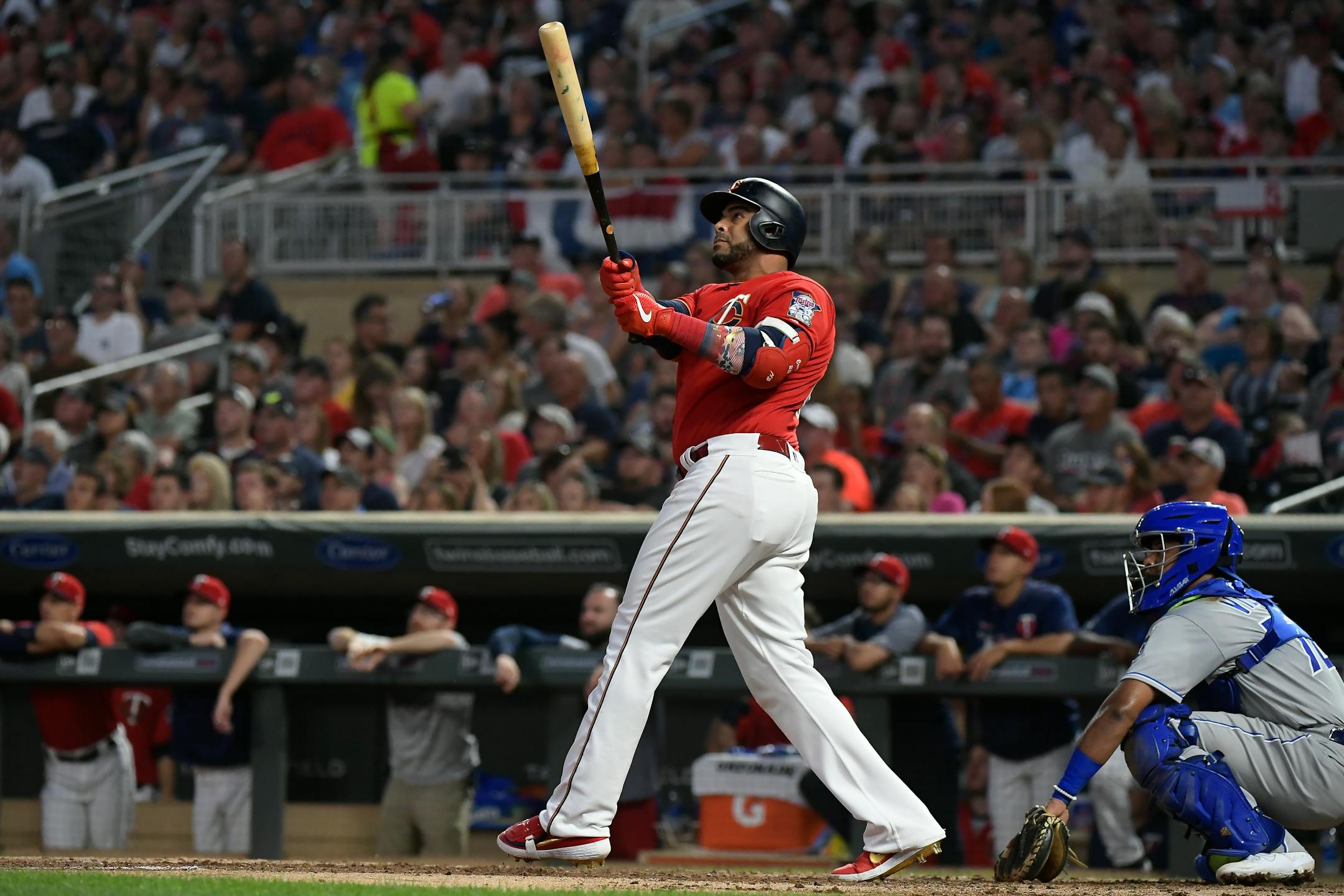 Twins designated hitter Nelson Cruz followed through with his swing after hitting a solo home run against the Kansas City Royals in the bottom of the second inning.