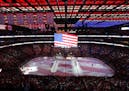 The national anthem is played before the Detroit Red Wings-Minnesota Wild NHL hockey game Thursday, Oct. 5, 2017, in Detroit. (AP Photo/Paul Sancya)