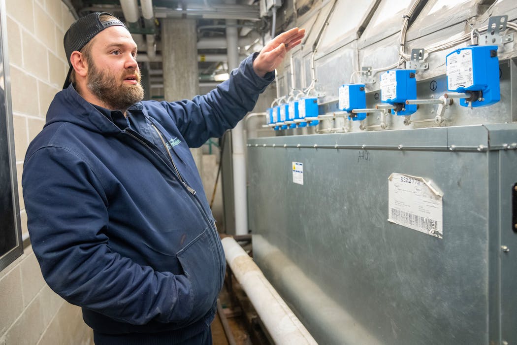 Chris Stellwag, the chief operating engineer at Como Zoo, explained how air handling units receive steam from the boiler room to heat the primate building Tuesday.
