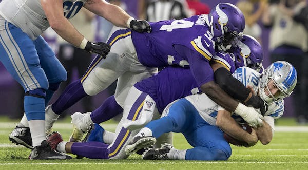 Minnesota Vikings' Everson Griffen (97) sacked Detroit Lions quarterback David Blough (10) in the fourth quarter during a game on Dec. 8, 2019 at U.S.