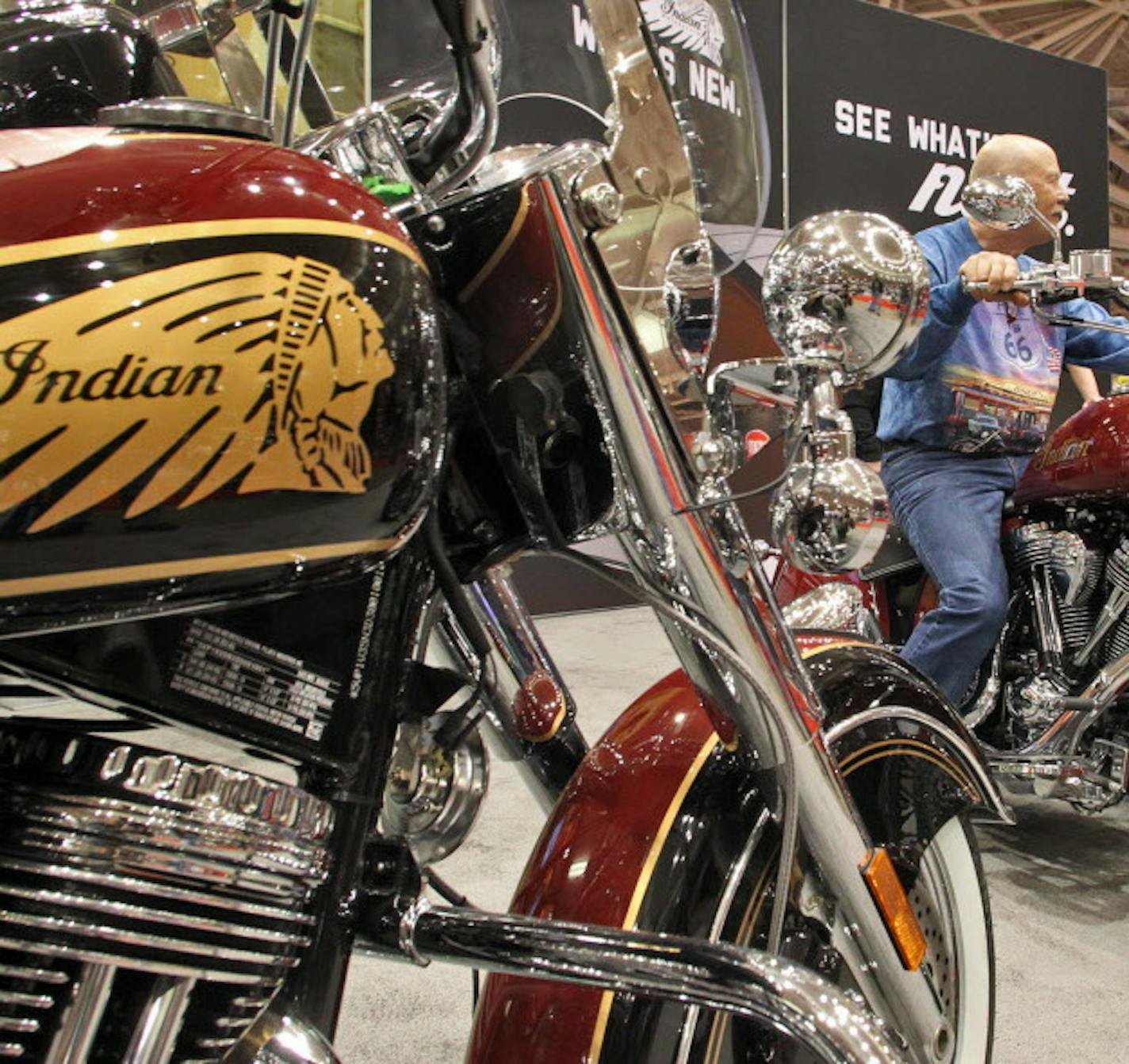 Polaris and Indian Motorcycles are combining forces in launching a new motorcycle for 2014. The Motorcycle Show at the Minneapolis Convention Center featured a display of cycles. Show patrons sat on the Indian 2013 models. (MARLIN LEVISON/STARTRIBUNE(mlevison@startribune.com (cq - ) ORG XMIT: MIN1301111801230881