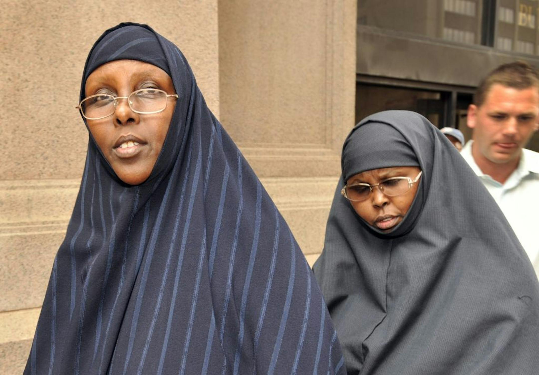 Defendants Hawo Mohamed Hassan, left, and Amina Farah Ali, both of Rochester, after a court hearing in August. During her trial, Ali was jailed briefly for refusing to stand for the judge and jury.