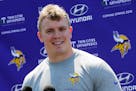 Minnesota Vikings rookie center Pat Elflein, out of Ohio State, takes questions from the media during the NFL football team's rookies minicamp Friday,