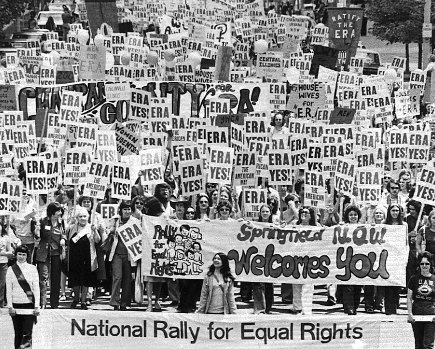 FILE - In this May 16, 1976, file photo, an estimated 10,000 marchers descend on the Capitol building in Springfield, Ill., to demonstrate for the passage of the Equal Rights Amendment. Many opponents of the Equal Rights Amendment considered it dead when a 10-year ratification push failed in 1982, yet its backers on Capitol Hill, in the Illinois statehouse and elsewhere are making clear this summer 2014 that the fight is far from over. (AP Photo/File) ORG XMIT: MIN2014091116035291