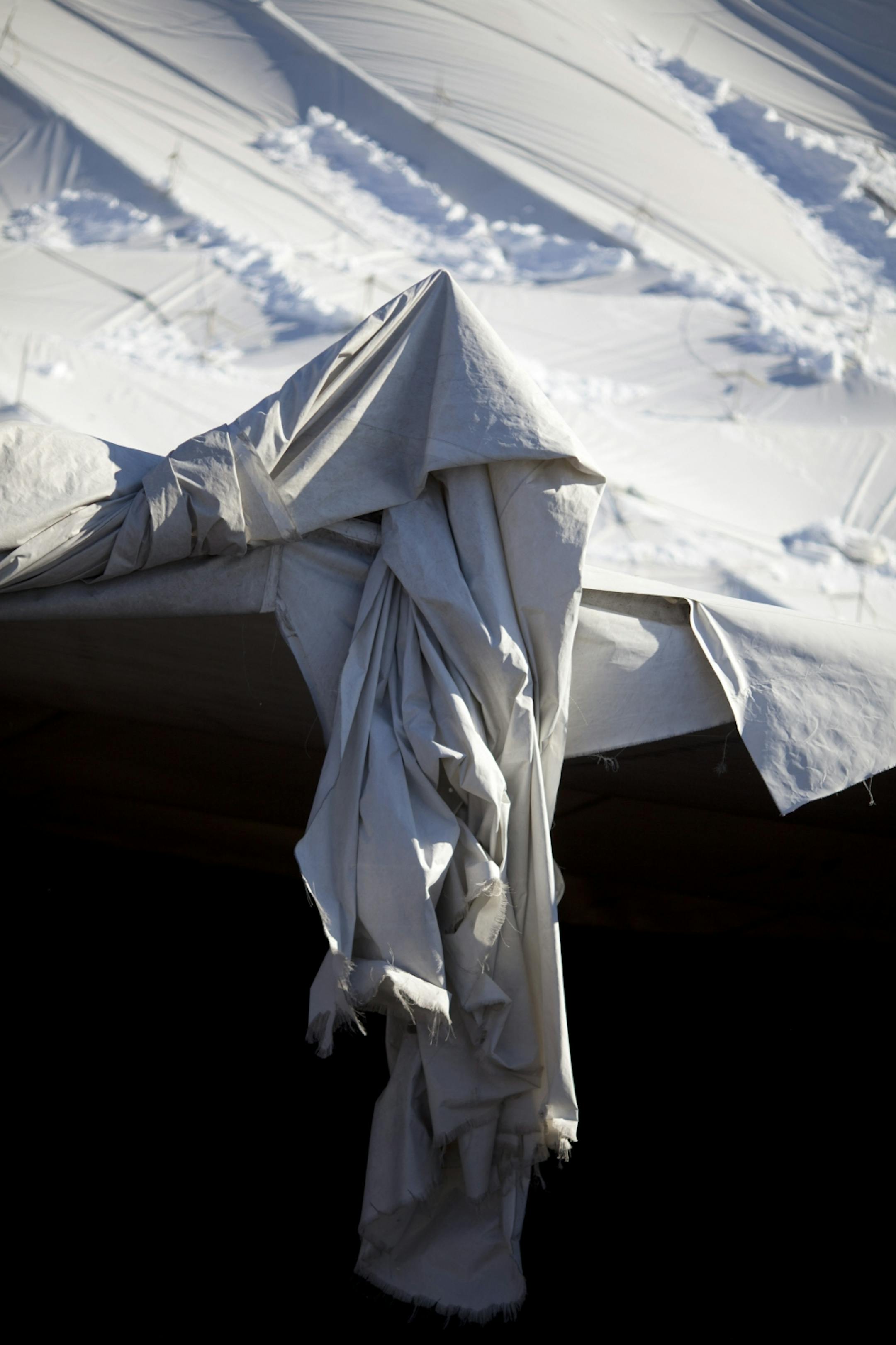 A shredded portion of the Metrodome roof Sunday morning.