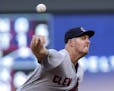 Cleveland Indians' Trevor Bauer pitches to a Minnesota Twins batter during the first inning of a baseball game Tuesday, July 31, 2018, in Minneapolis.