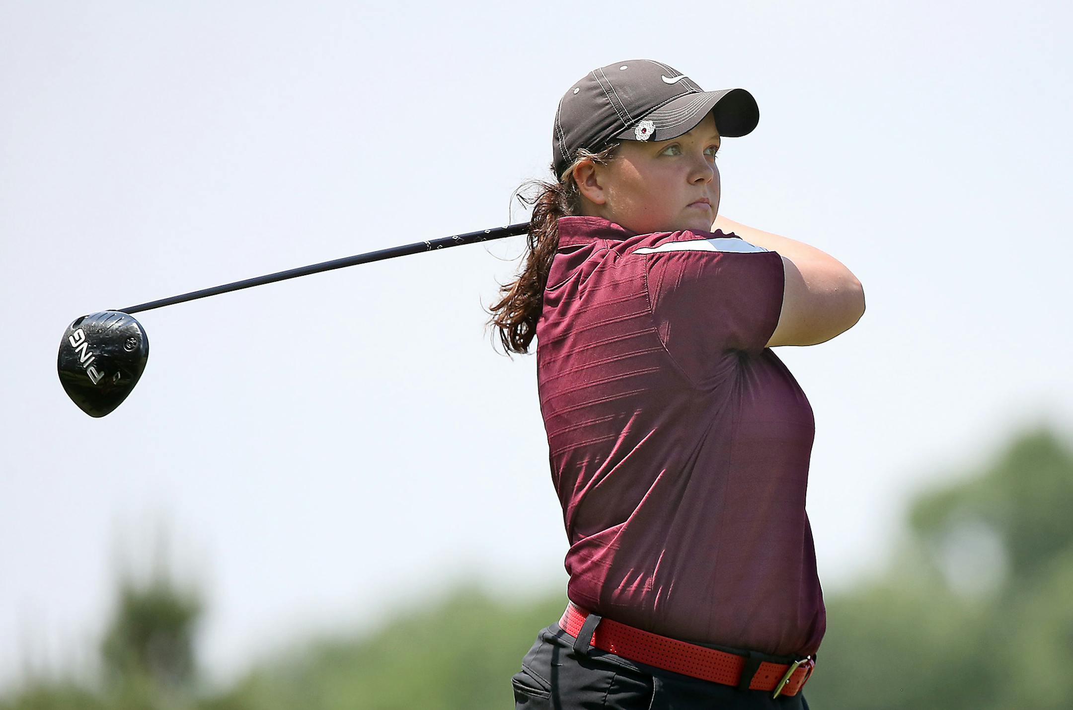 New Prague's Taylor Ledwein teed off during the Class 3A golf tournament at Bunker Hills in 2015.