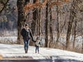 Jessica Jones walks with her daughter Braelyn at Cottage Grove Ravine Park on a sunny Tuesday afternoon. ] MATT WEBER &#x2022;