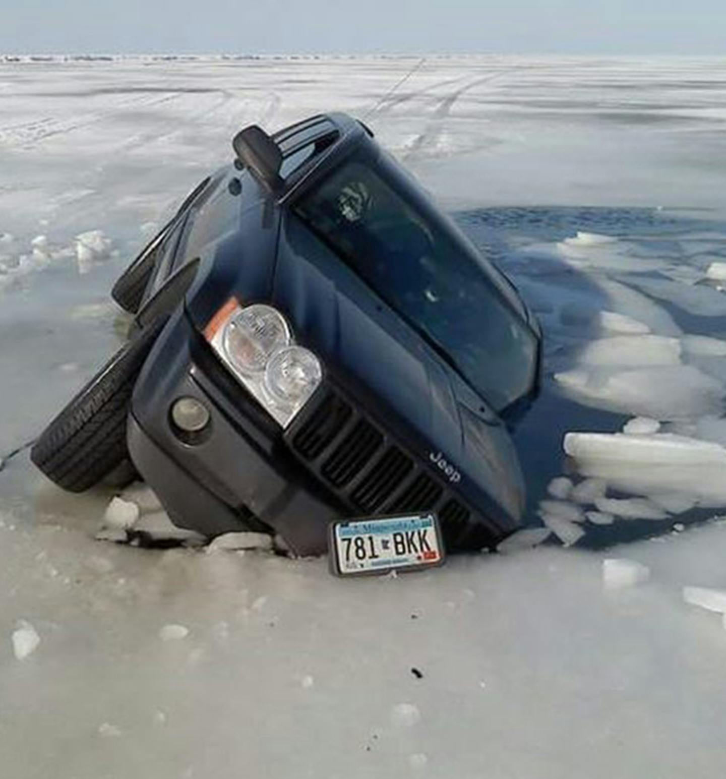 A sport utility vehicle wound up partially submerged after breaking through the Mille Lacs ice.